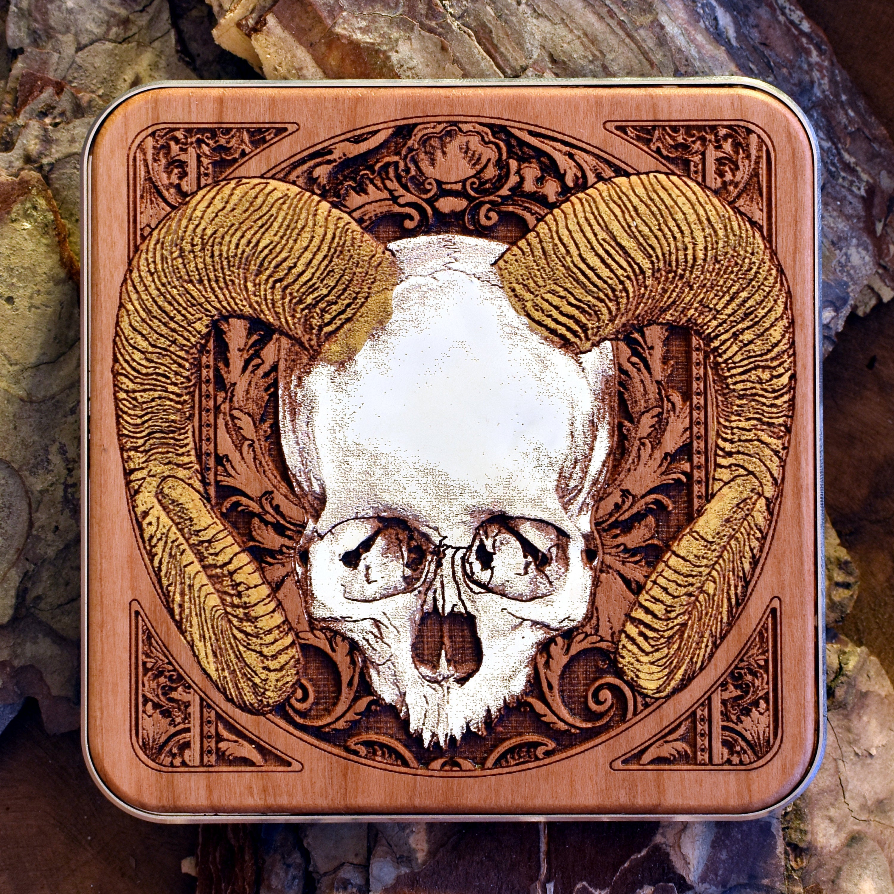 Gothic wooden wireless charger with engraved human skull art, compatible with iPhone 16 and Galaxy S25, perfect dark gift.