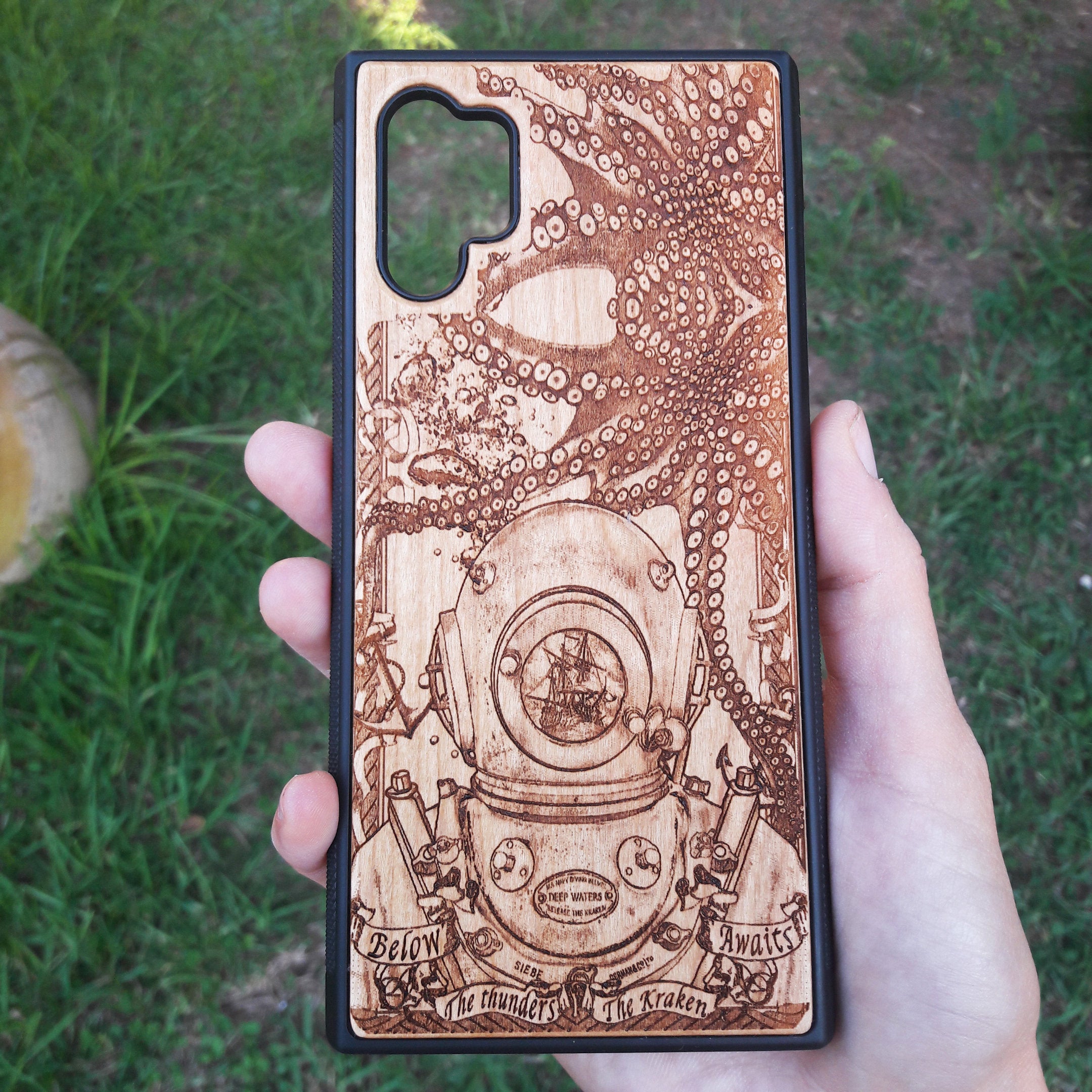 Wooden phone case featuring a detailed deep-sea diver and kraken design, laser-engraved for iPhone , iPhone 15, Samsung Galaxy S, and other models. A must-have for fans of nautical and mythical art.