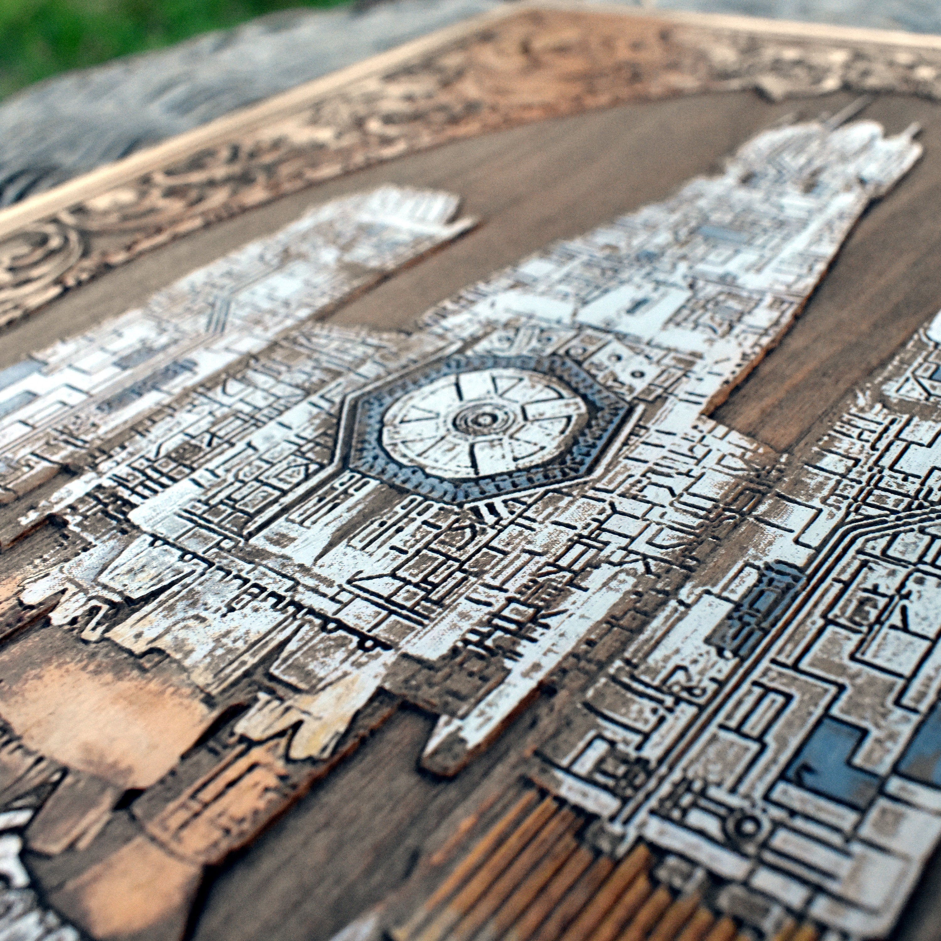 Alien-themed wood wall art showing the Nostromo in vintage style.