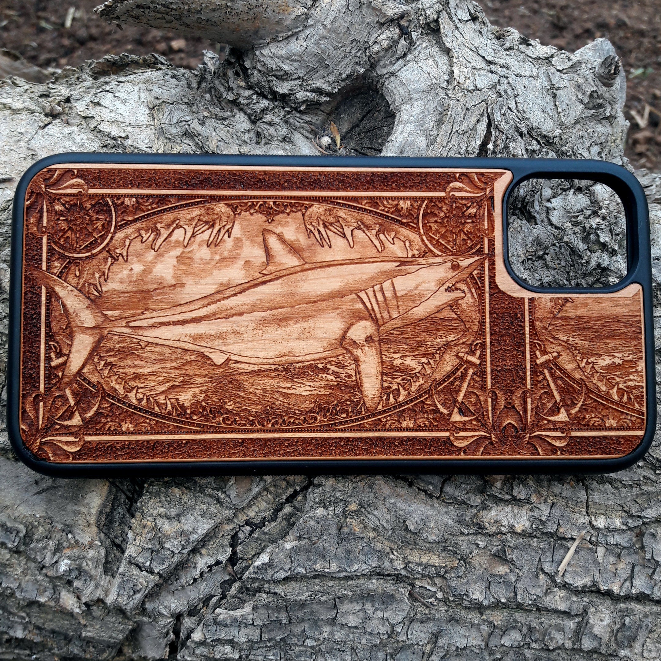 Wooden phone case featuring an intricately carved Mako Shark design, ideal for iPhone , iPhone 15, Galaxy S23, S22 Ultra, and other models. Perfect for marine wildlife lovers and nautical art enthusiasts.