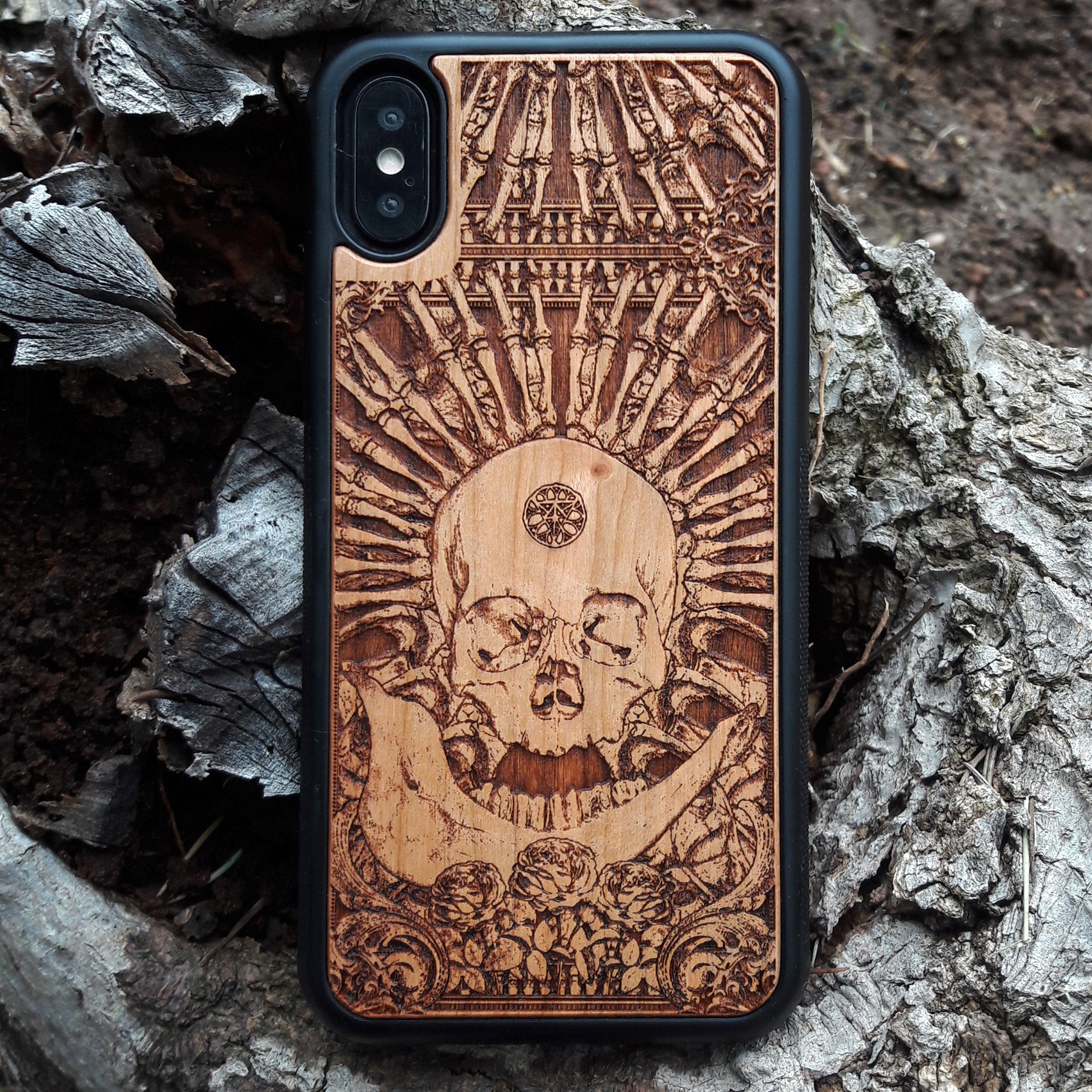 Wooden phone case with intricate gothic skull design, available for iPhone , iPhone 15, Galaxy S, Note 20, and more. Ideal for horror lovers and fans of unique, handcrafted accessories.