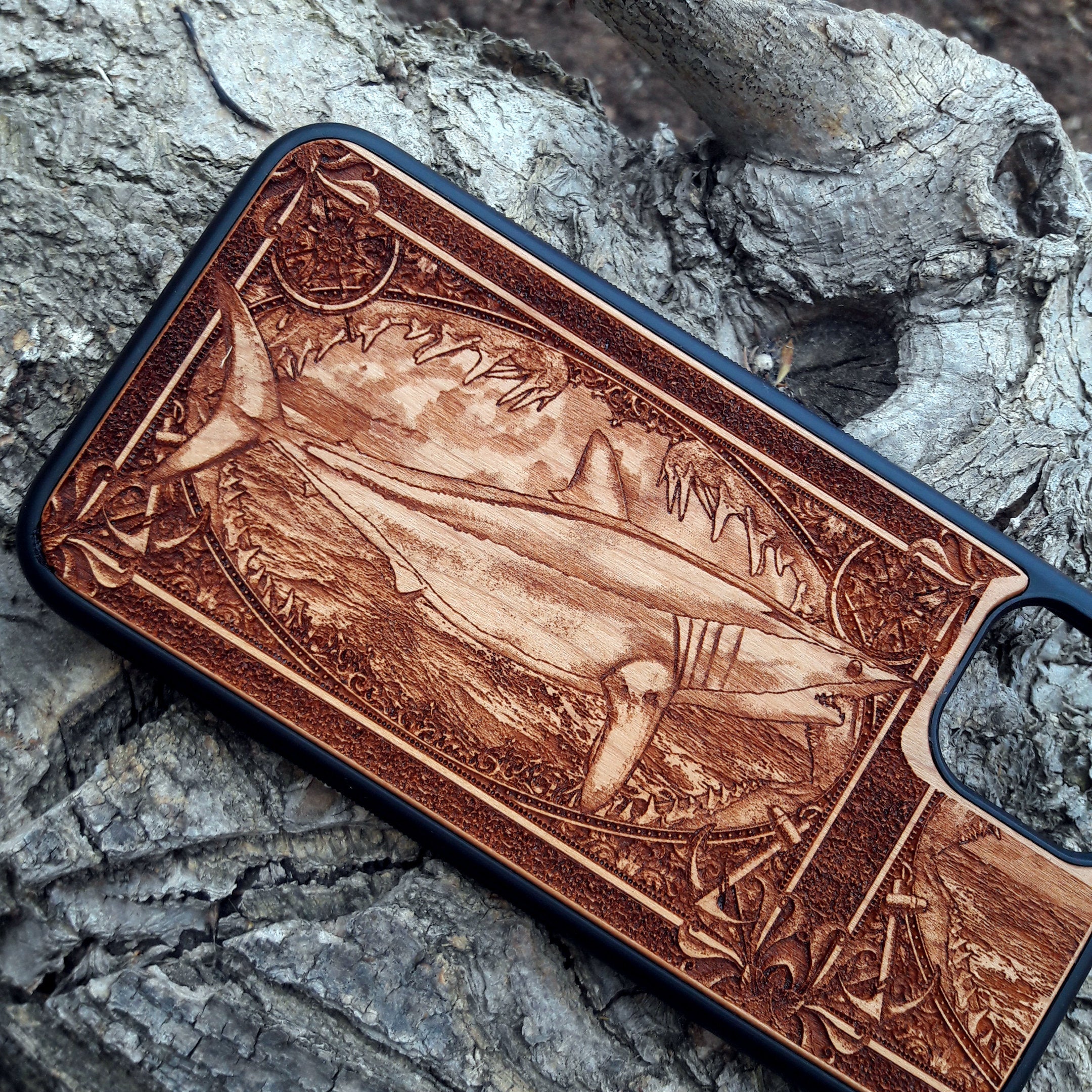 Wooden phone case featuring an intricately carved Mako Shark design, ideal for iPhone , iPhone 15, Galaxy S23, S22 Ultra, and other models. Perfect for marine wildlife lovers and nautical art enthusiasts.
