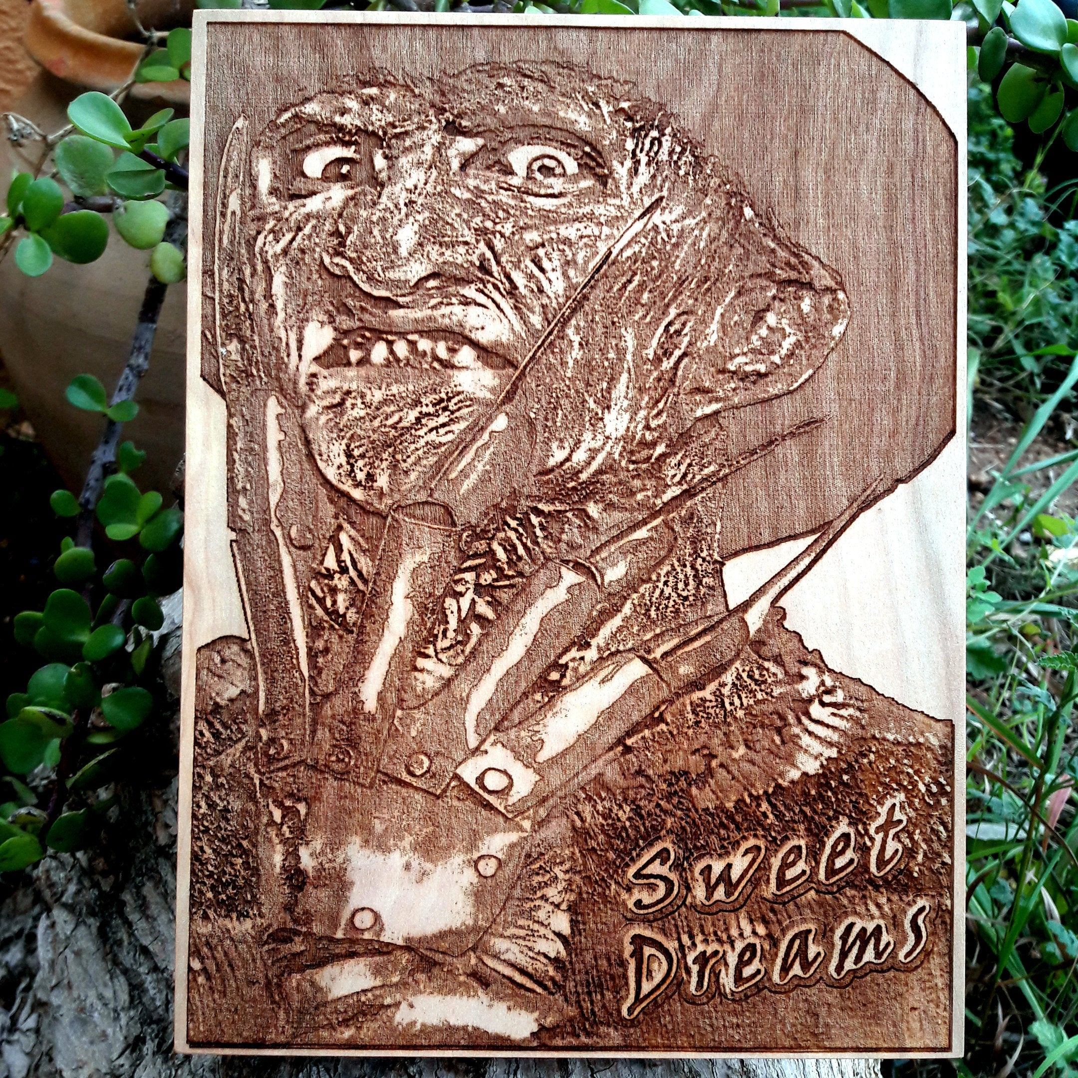 Freddy Krueger horror wood artwork, laser-engraved for Halloween wall decor.
