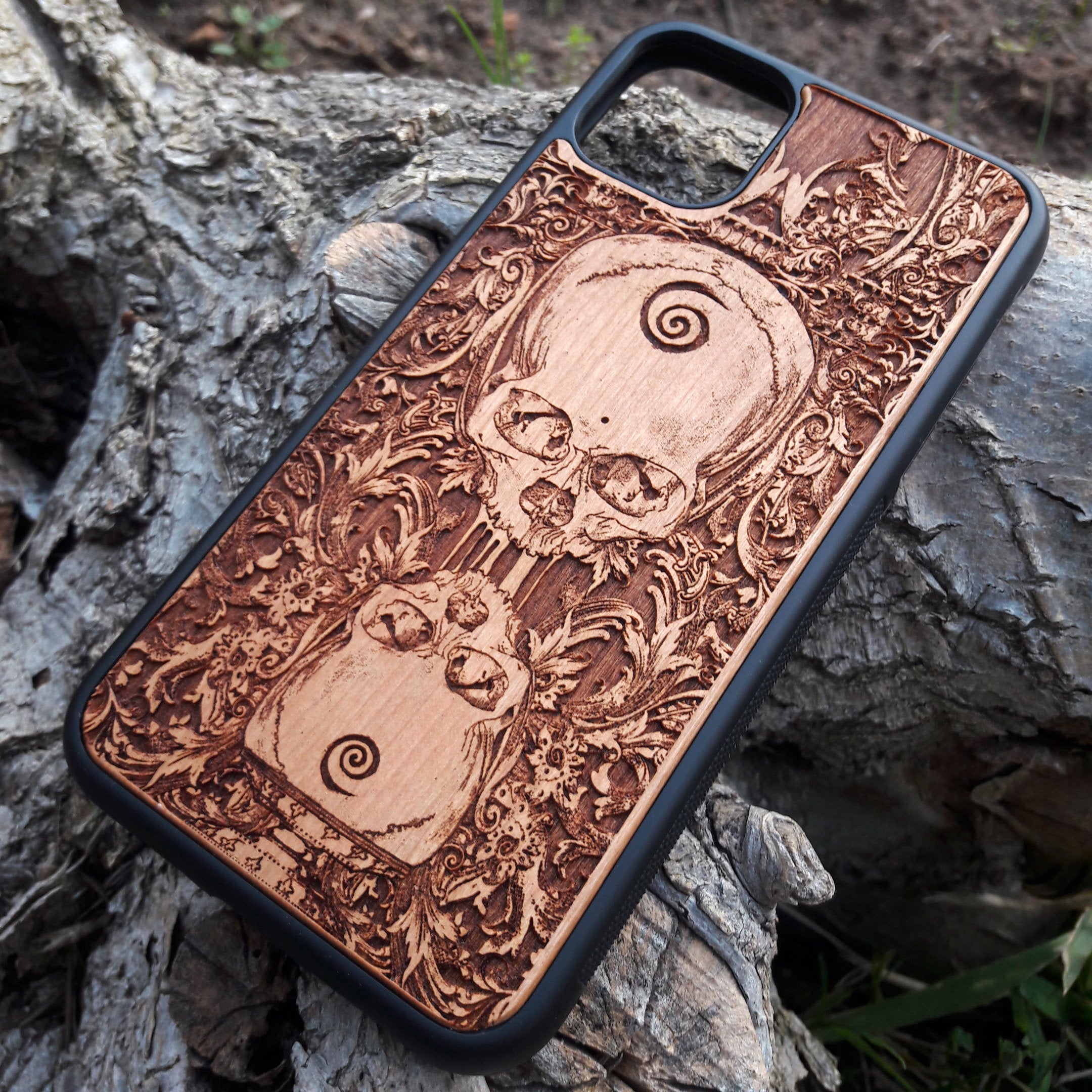 Wooden phone case with a detailed praying skeleton design, carved for iPhone , iPhone 15, Galaxy S, Galaxy S24, and other models. A gothic and artistic phone accessory, offering unique style and durable protection.