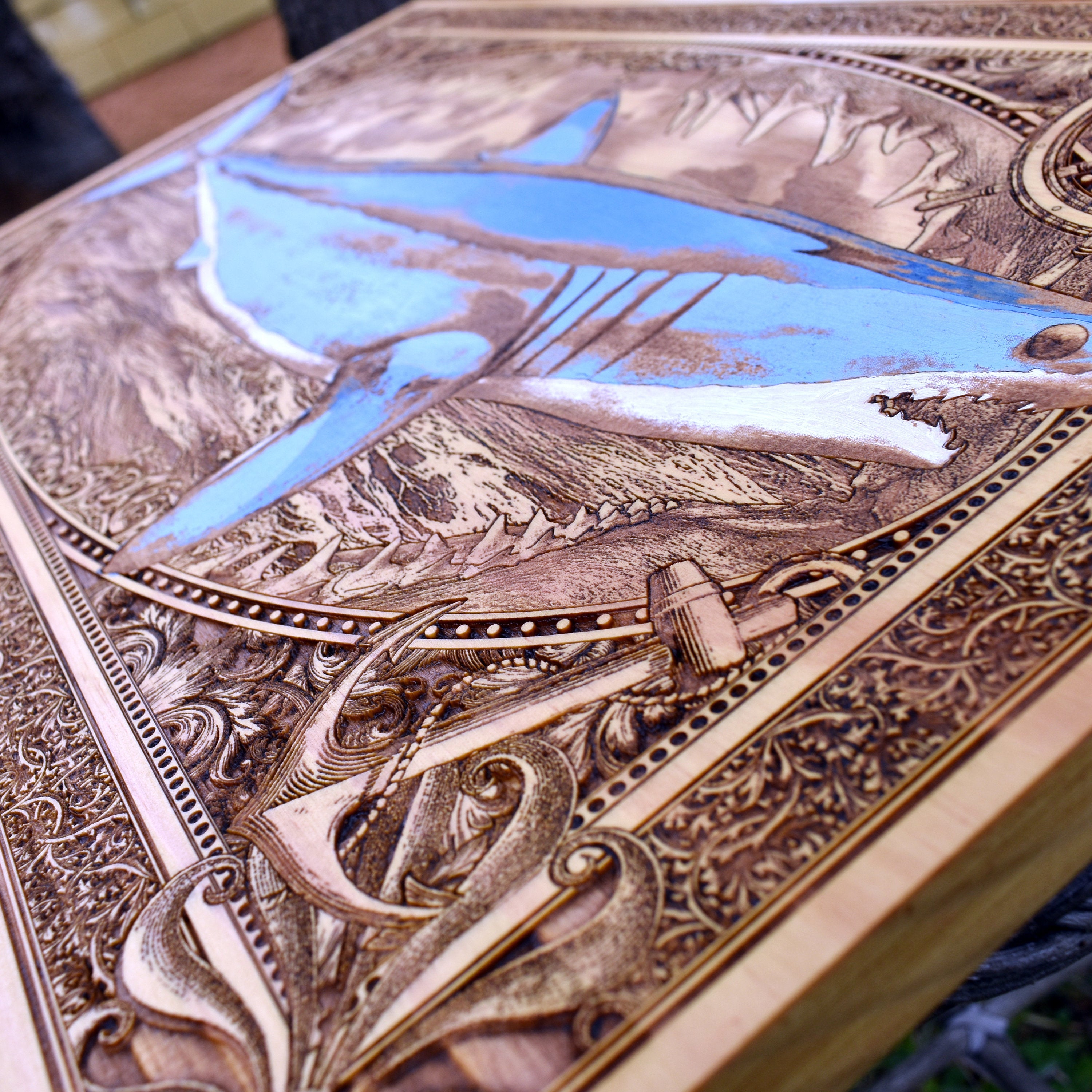 Extra-large blue mako shark wood wall art, diagonal detail of the shark and ornate nautical border