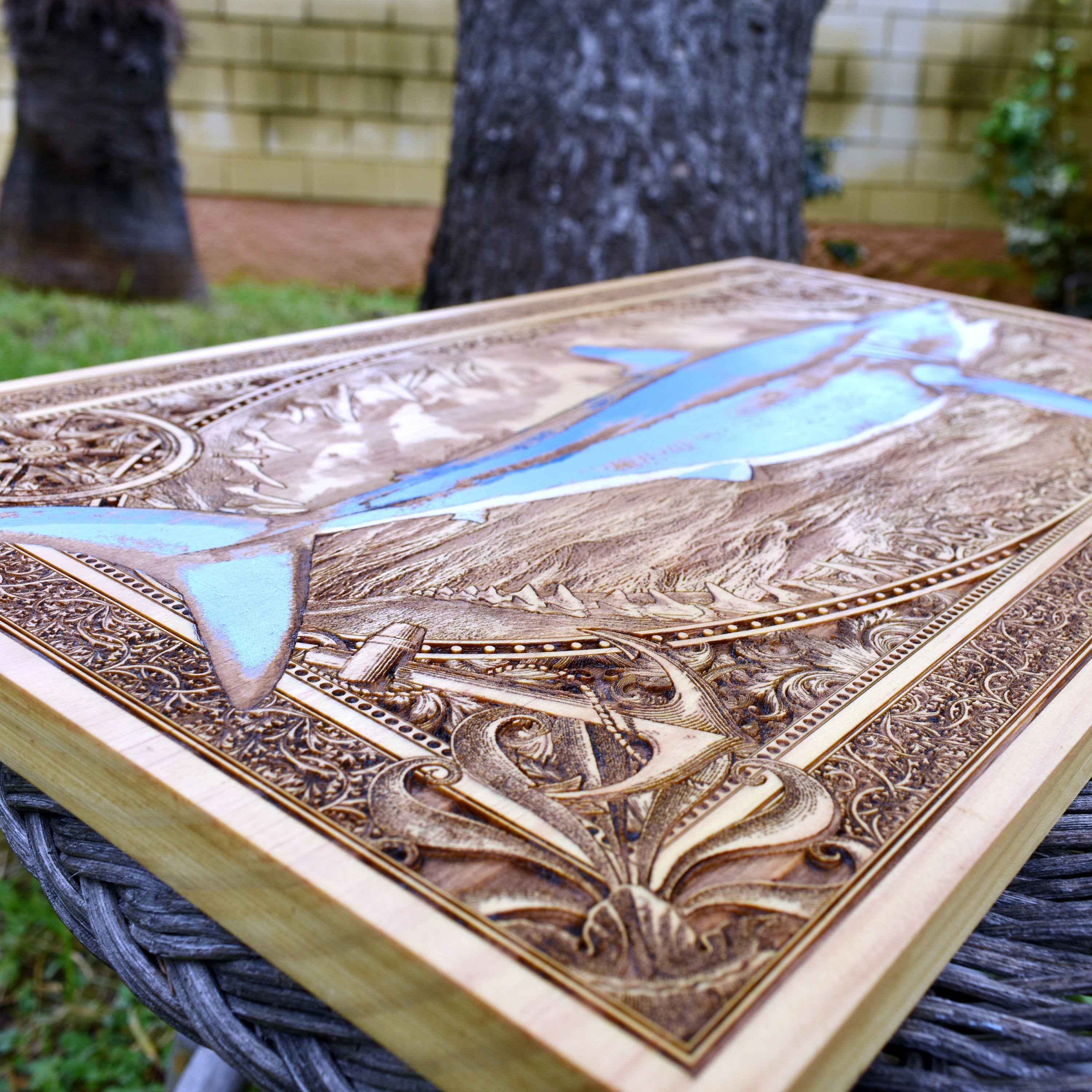 Extra-large blue mako shark wood wall art, low side perspective showing the solid wood panel