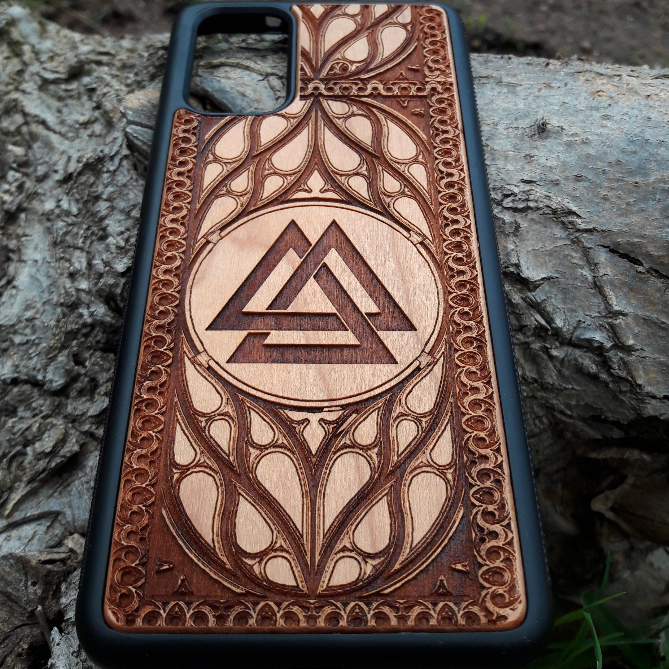Viking Valknut Symbol Wood Phone Case for iPhone & Samsung Galaxy featuring laser-engraved Viking art. Compatible with iPhone 15, 14, 13, 12, 11 Pro Max Mini & Samsung Galaxy S24 S23 S22 S21 S20 Ultra Plus. Durable and stylish.