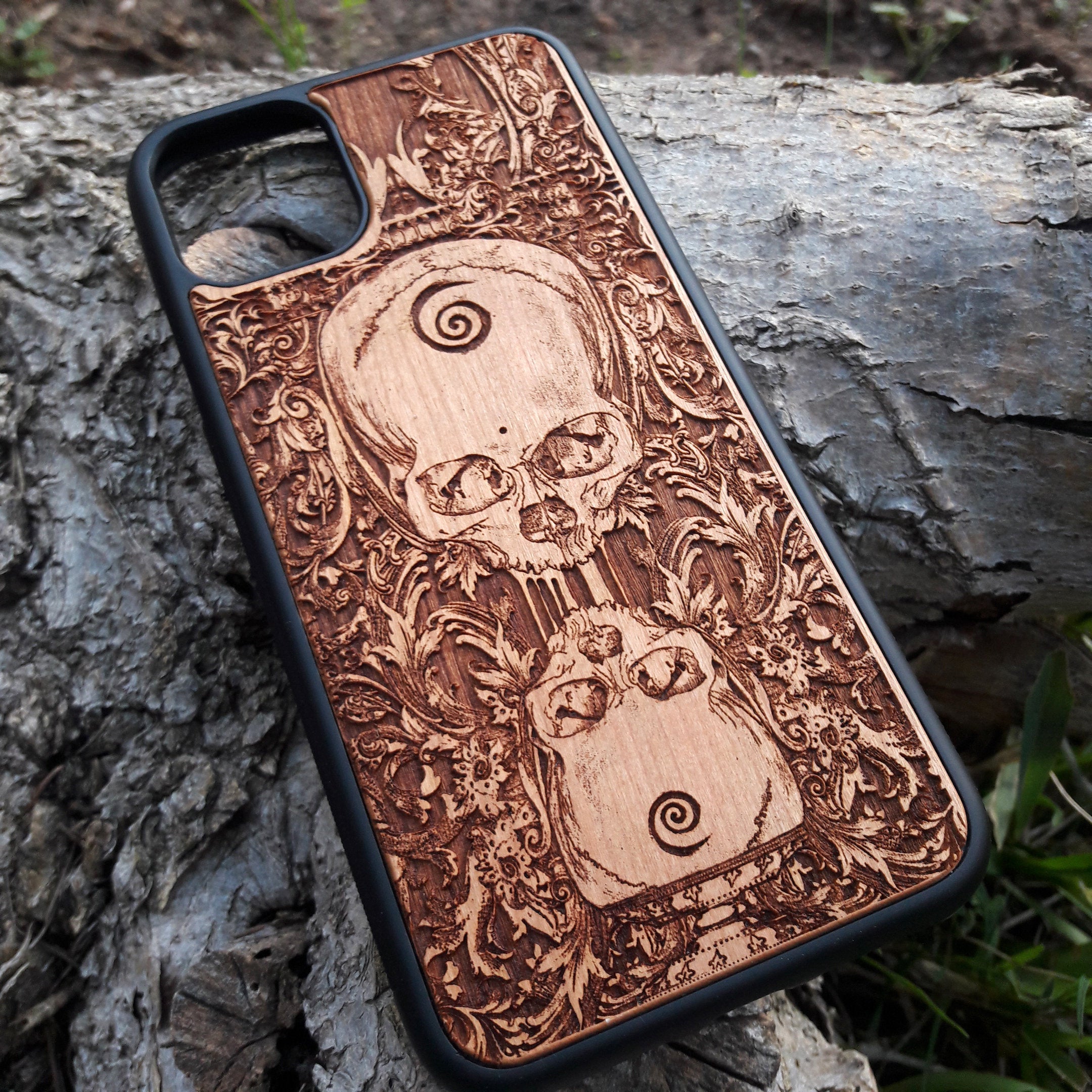 Wooden phone case with a detailed praying skeleton design, carved for iPhone , iPhone 15, Galaxy S, Galaxy S24, and other models. A gothic and artistic phone accessory, offering unique style and durable protection.e