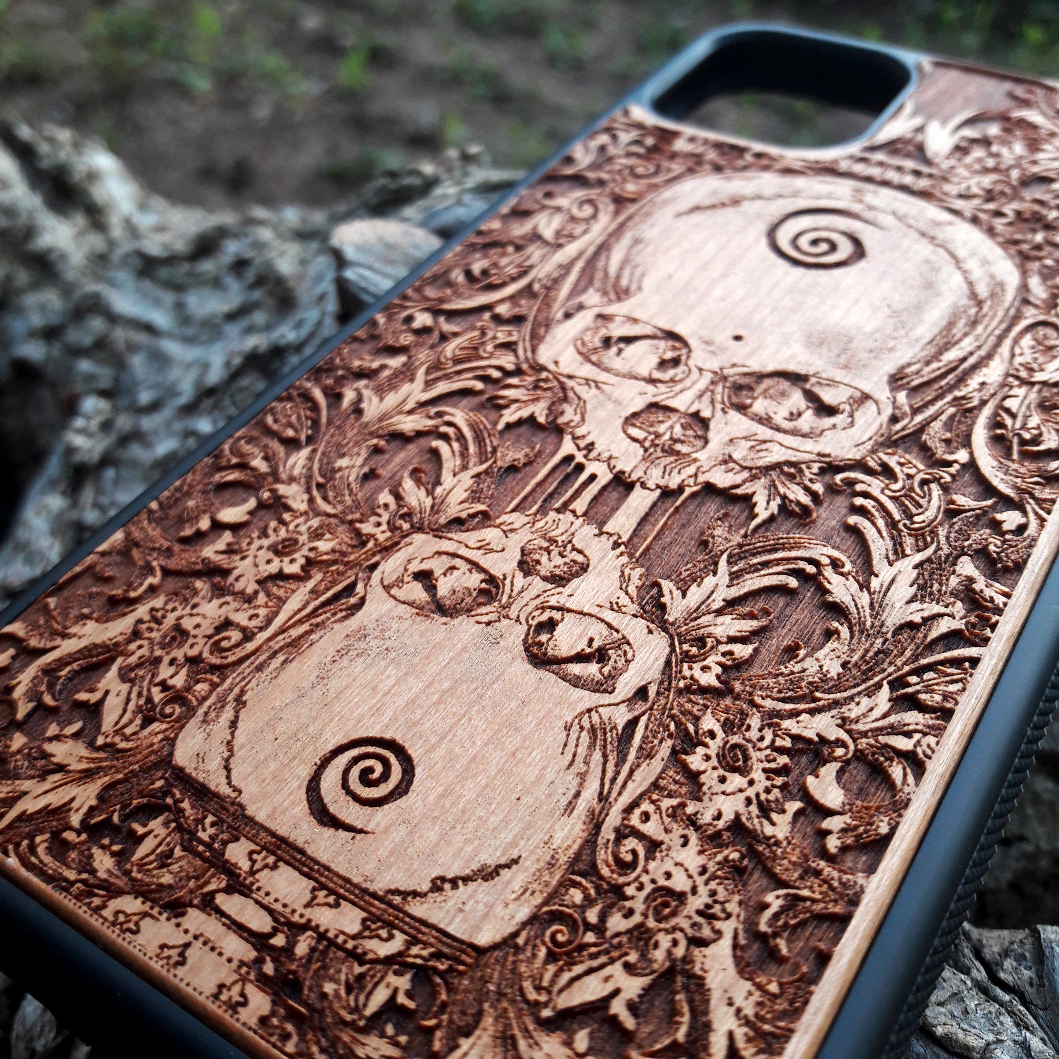 Wooden phone case with a detailed praying skeleton design, carved for iPhone , iPhone 15, Galaxy S, Galaxy S24, and other models. A gothic and artistic phone accessory, offering unique style and durable protection.