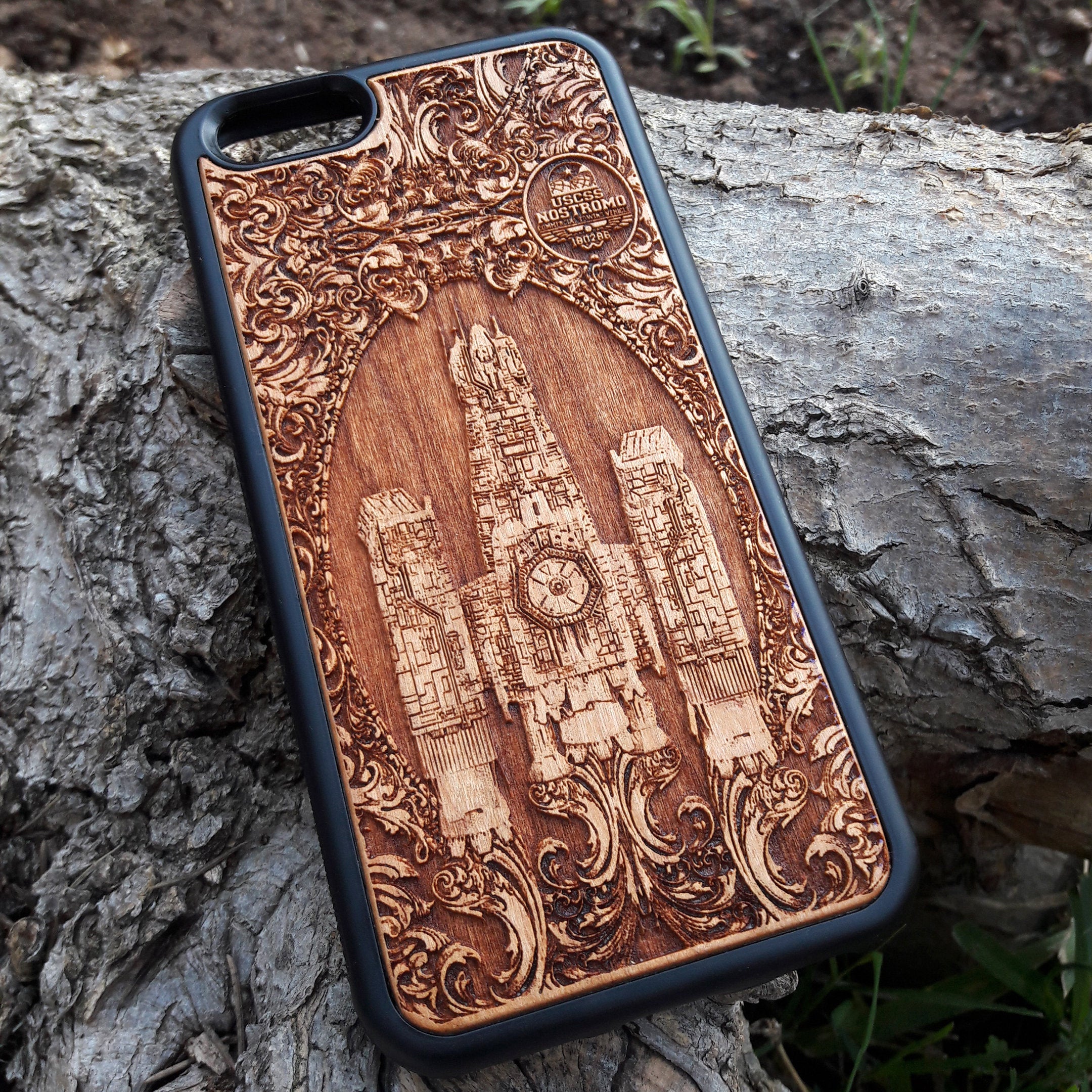 Wooden phone case with detailed Nostromo ship design from the Alien movie, engraved for iPhone , Samsung Galaxy S, and other models. Perfect for sci-fi and Alien franchise fans, offering protection and style.