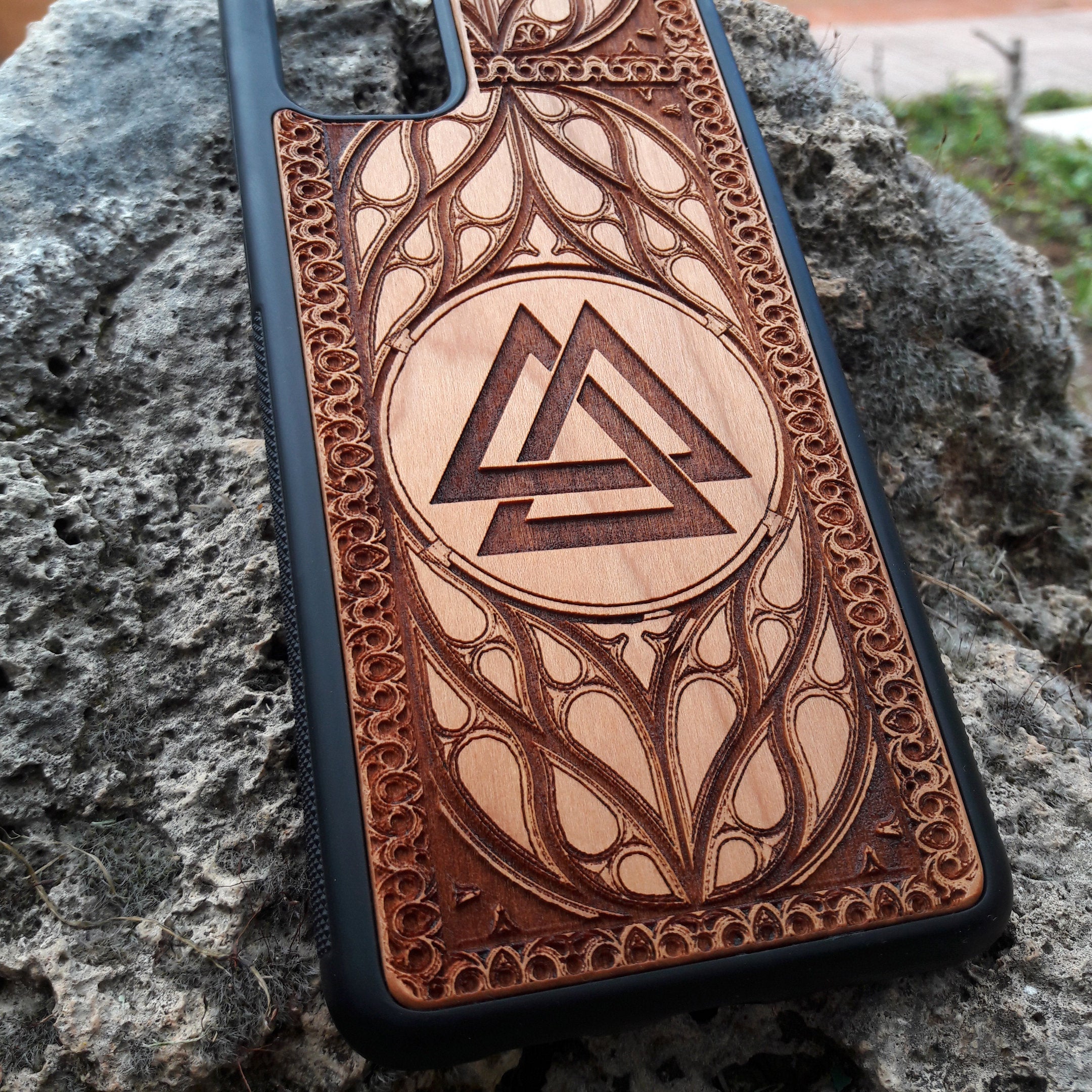 Viking Valknut Symbol Wood Phone Case for iPhone & Samsung Galaxy featuring laser-engraved Viking art. Compatible with iPhone 15, 14, 13, 12, 11 Pro Max Mini & Samsung Galaxy S24 S23 S22 S21 S20 Ultra Plus. Durable and stylish.