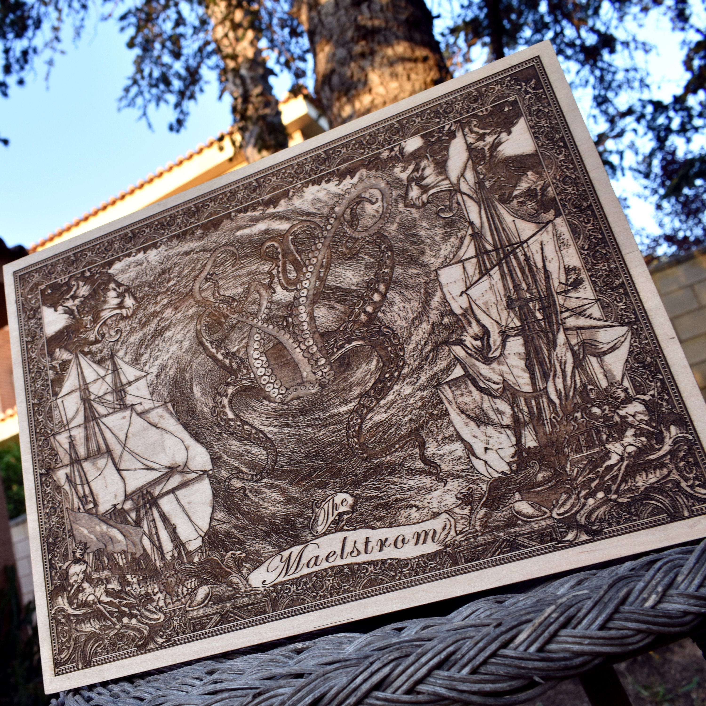 Nautical themed engraved wood wall decor with ocean spiral