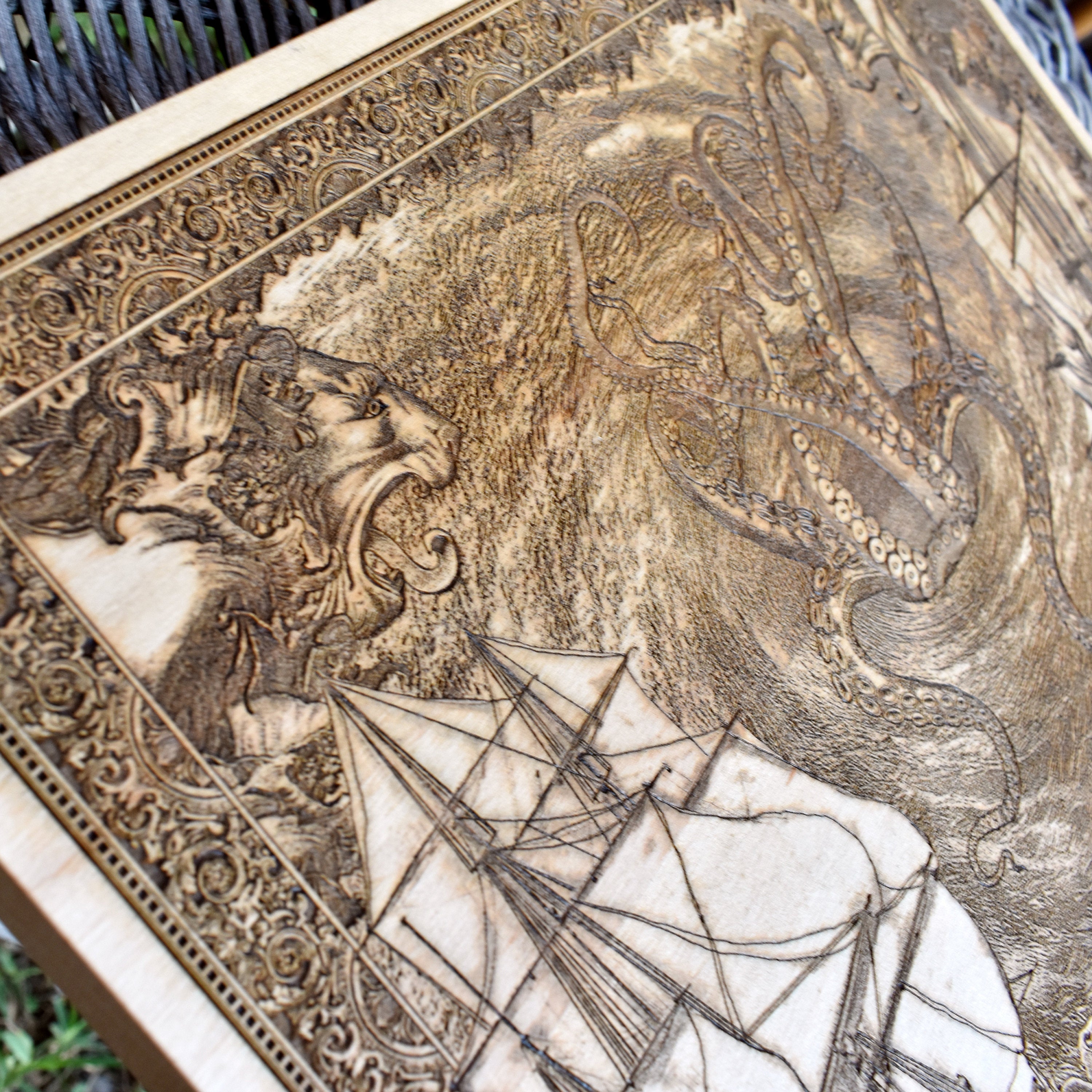 Handcrafted wooden artwork featuring swirling sea maelstrom