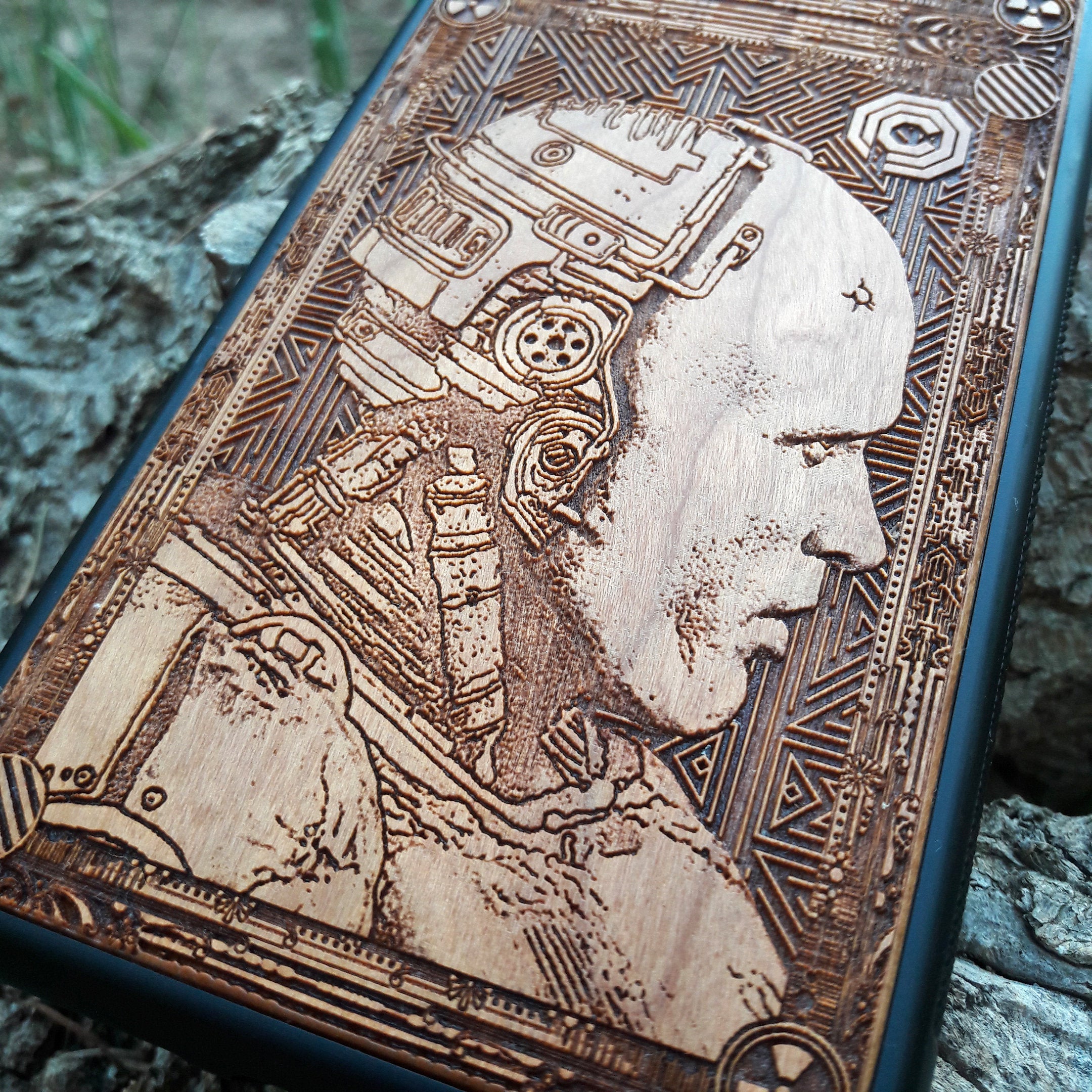 Laser-engraved Robocop wooden phone case, featuring a detailed sci-fi design, compatible with iPhone , iPhone 15, Samsung Galaxy S, Note 20, and more. Perfect for Robocop fans seeking a unique, durable phone accessory.