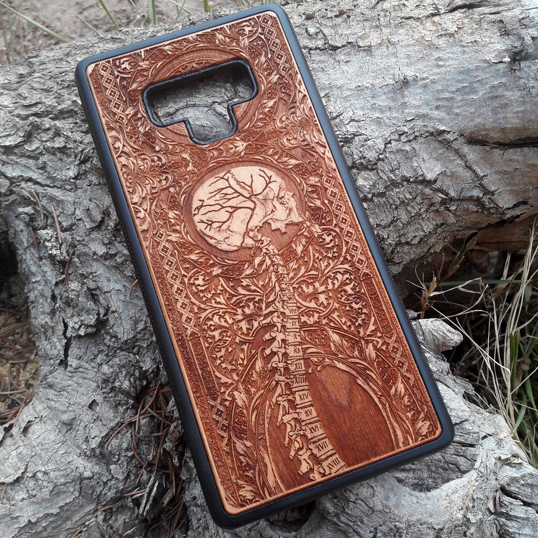 Wooden Spine phone case featuring detailed gothic carvings, compatible with iPhone , iPhone 15, Samsung Galaxy S, Note 20, and more. Ideal for lovers of gothic art and unique phone accessories.