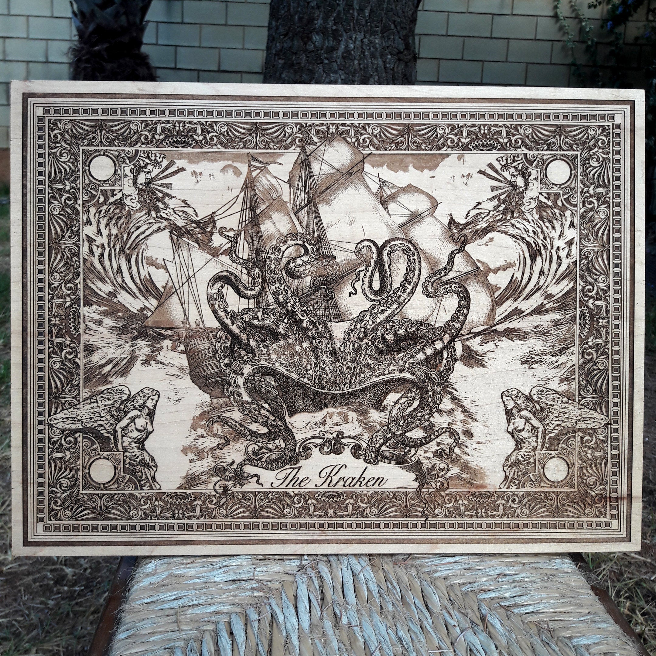 Kraken sea monster wood wall art, engraved for nautical decor lovers and collectors.