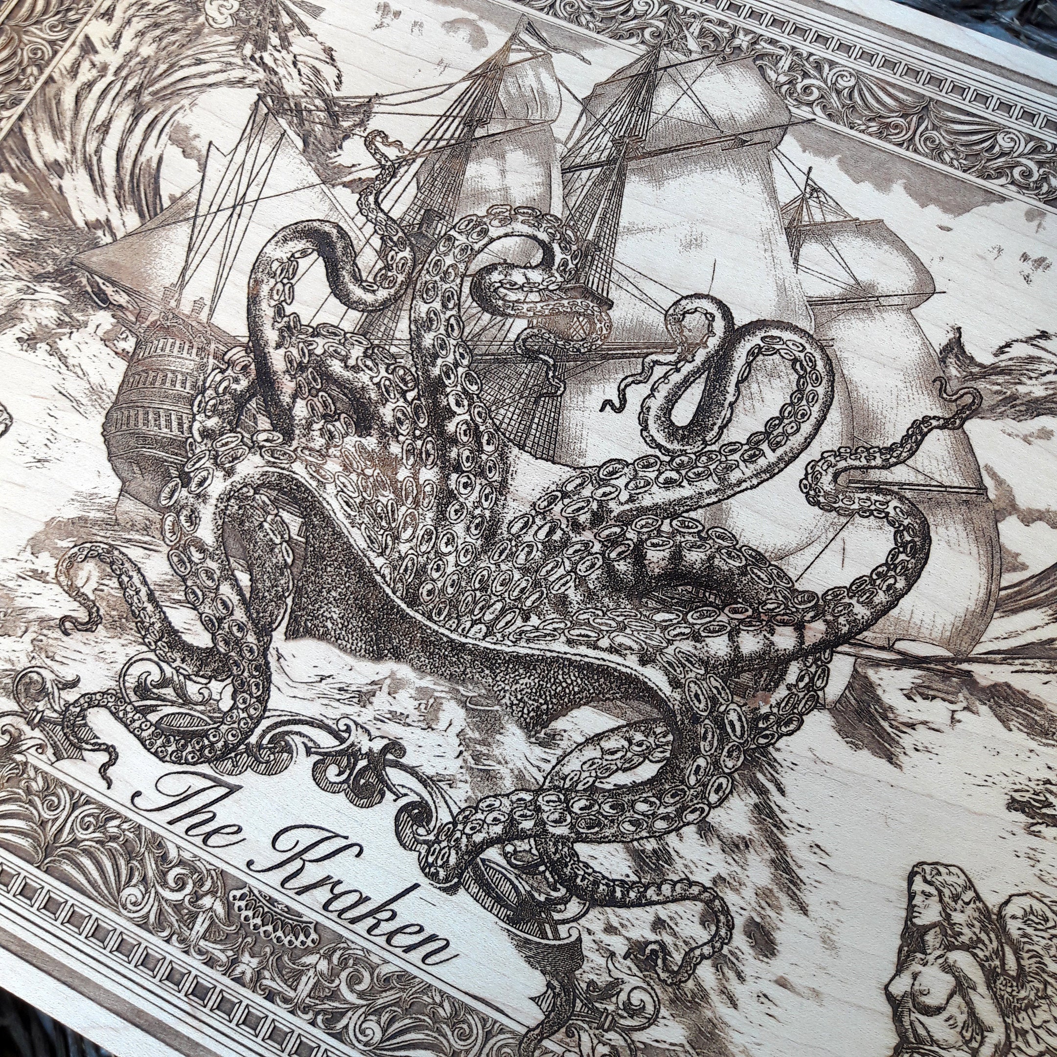 Engraved Kraken wall art, maritime-themed wooden plaque for bold interiors.