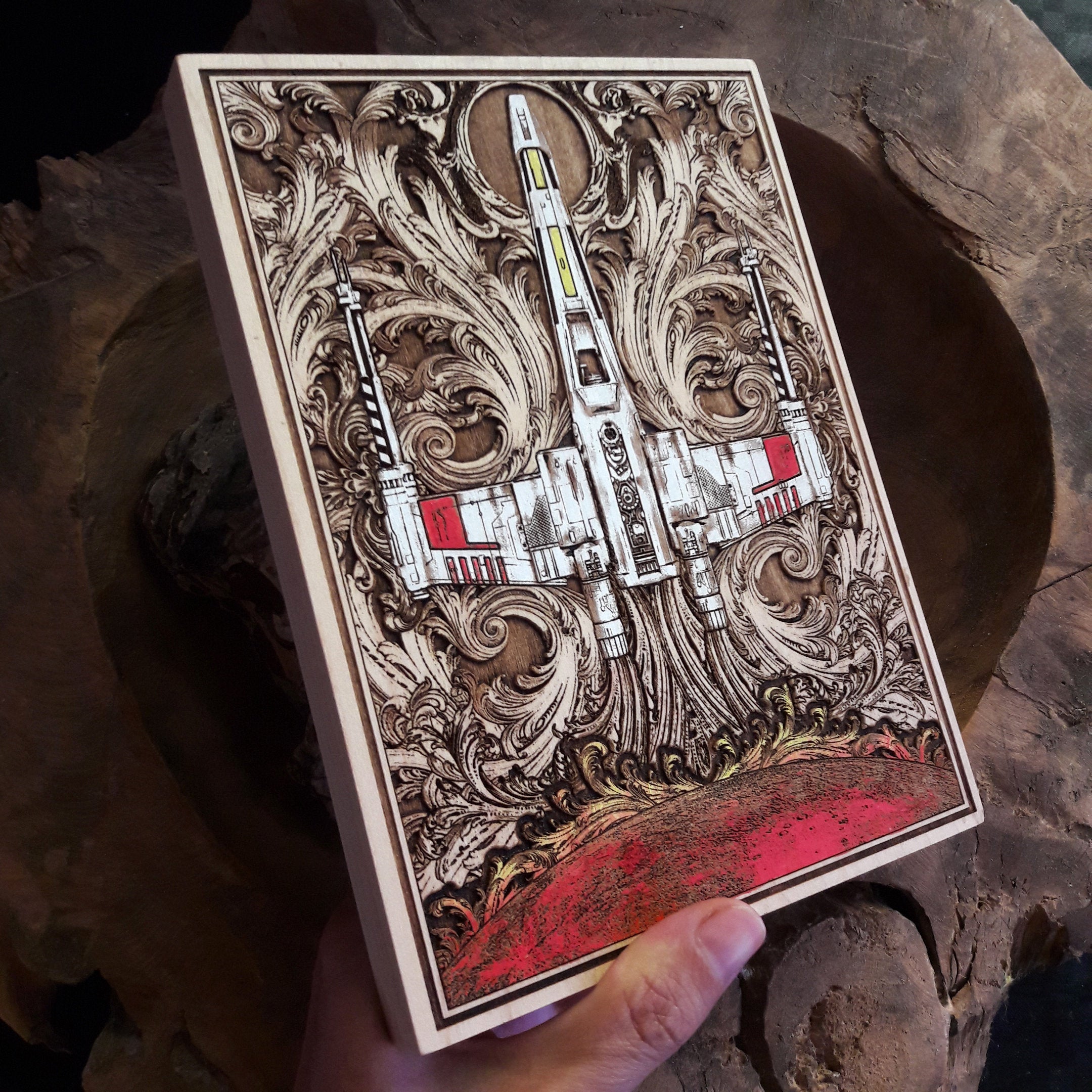 Handcrafted X-Wing wooden art from Star Wars, perfect for geeky decor