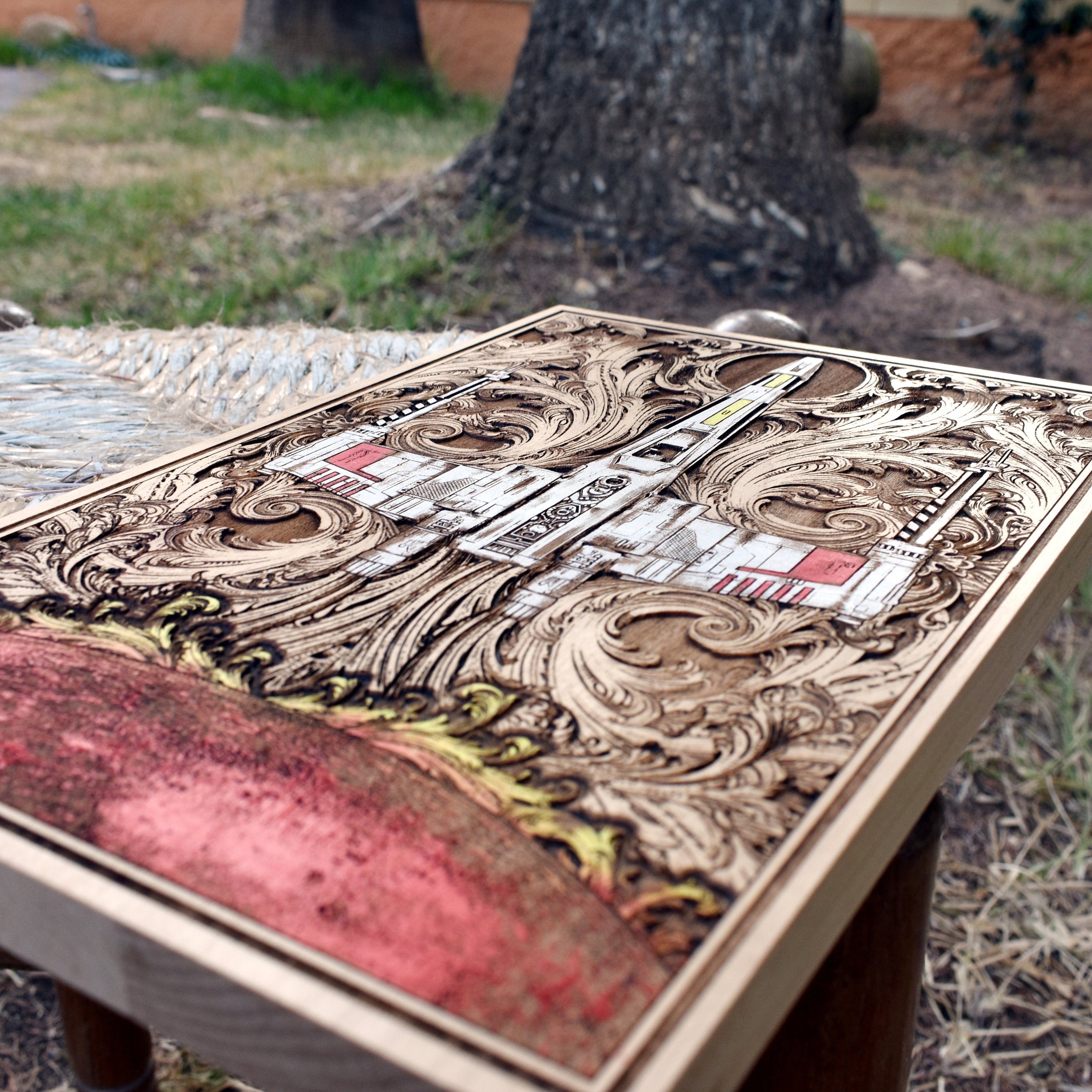 Engraved X-Wing spaceship artwork on premium handcrafted wood.