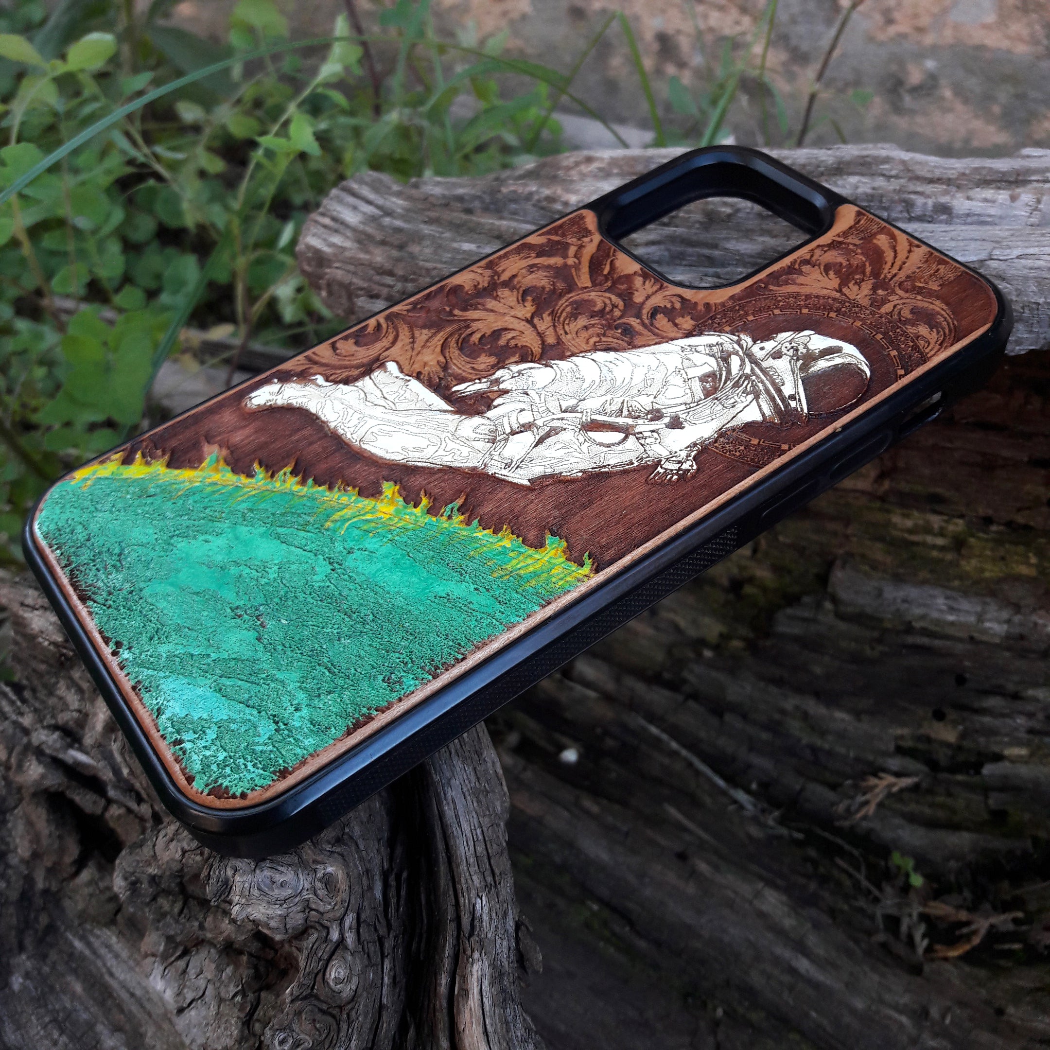 Hand-painted cherry wood phone case with vibrant green planet design.