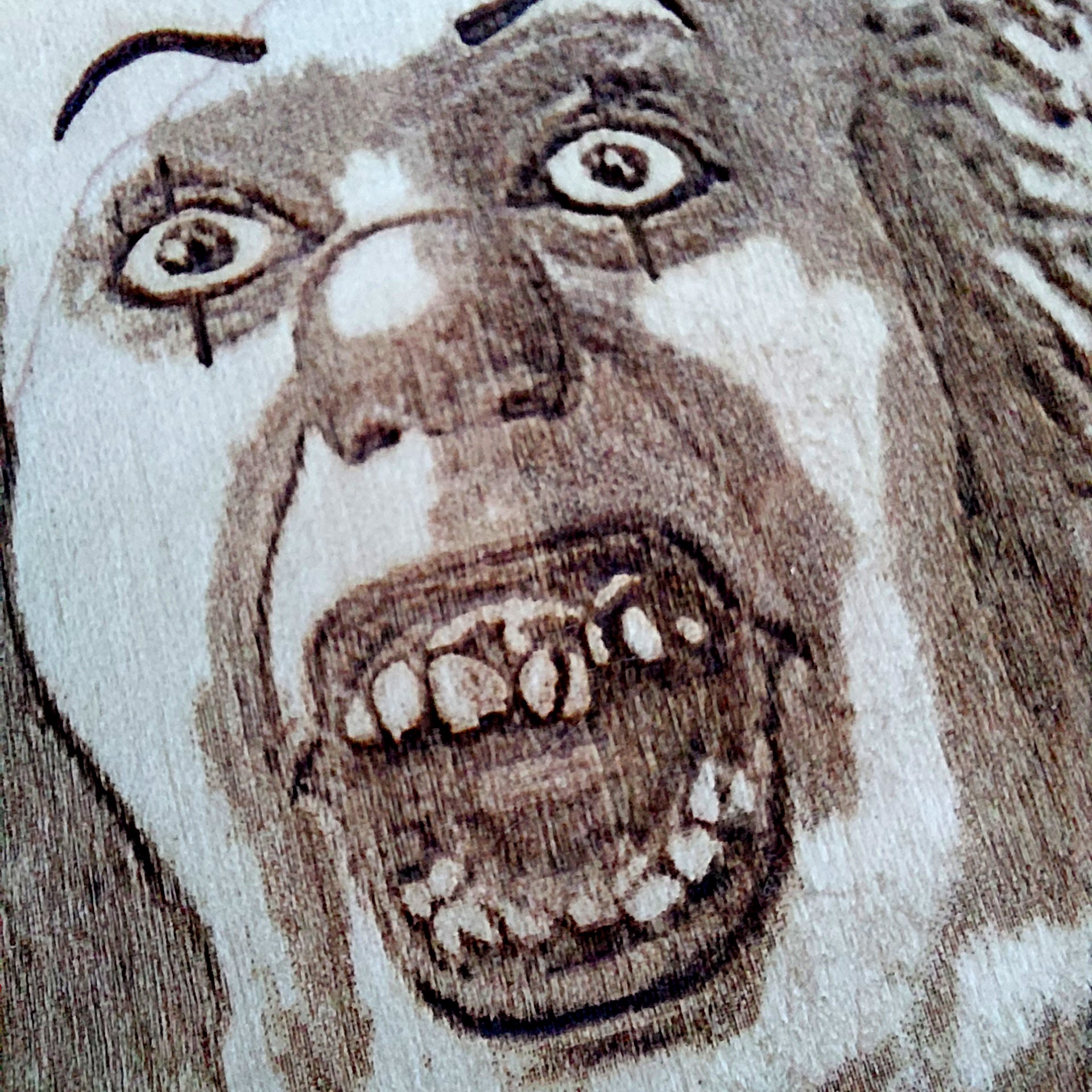 Horror movie-inspired clown artwork - handcrafted wooden decor