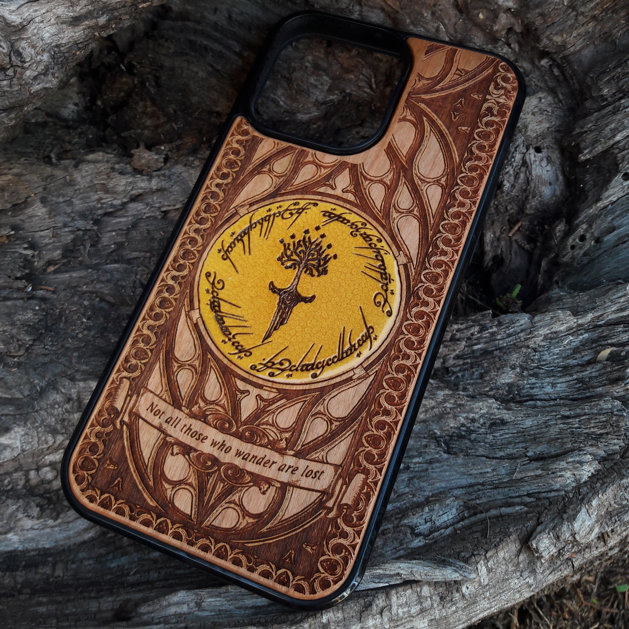 Lord of the Rings wood phone case featuring a stunning laser-engraved Tolkien design with intricate Elvish script and detailed patterns. Compatible with iPhone , iPhone 15, 14, 13, 12, 11 Pro Max Mini, and Samsung Galaxy S, S24, S23, S22, S21, S20 Ultra, Plus, Note 20. Durable, slim, and stylish, perfect for fans of Tolkien's Middle-Earth looking for a unique phone case.
