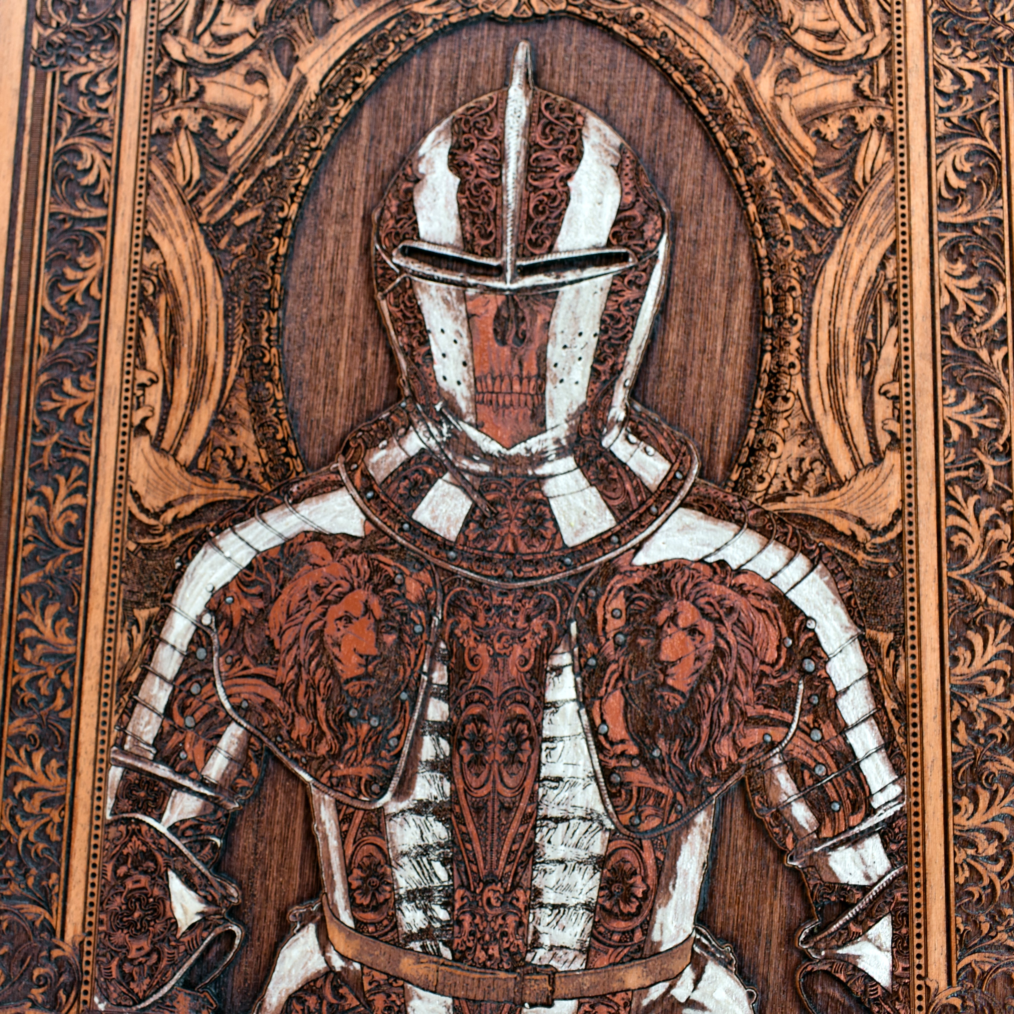 Detailed knight armor design engraved on rustic wood panel.
