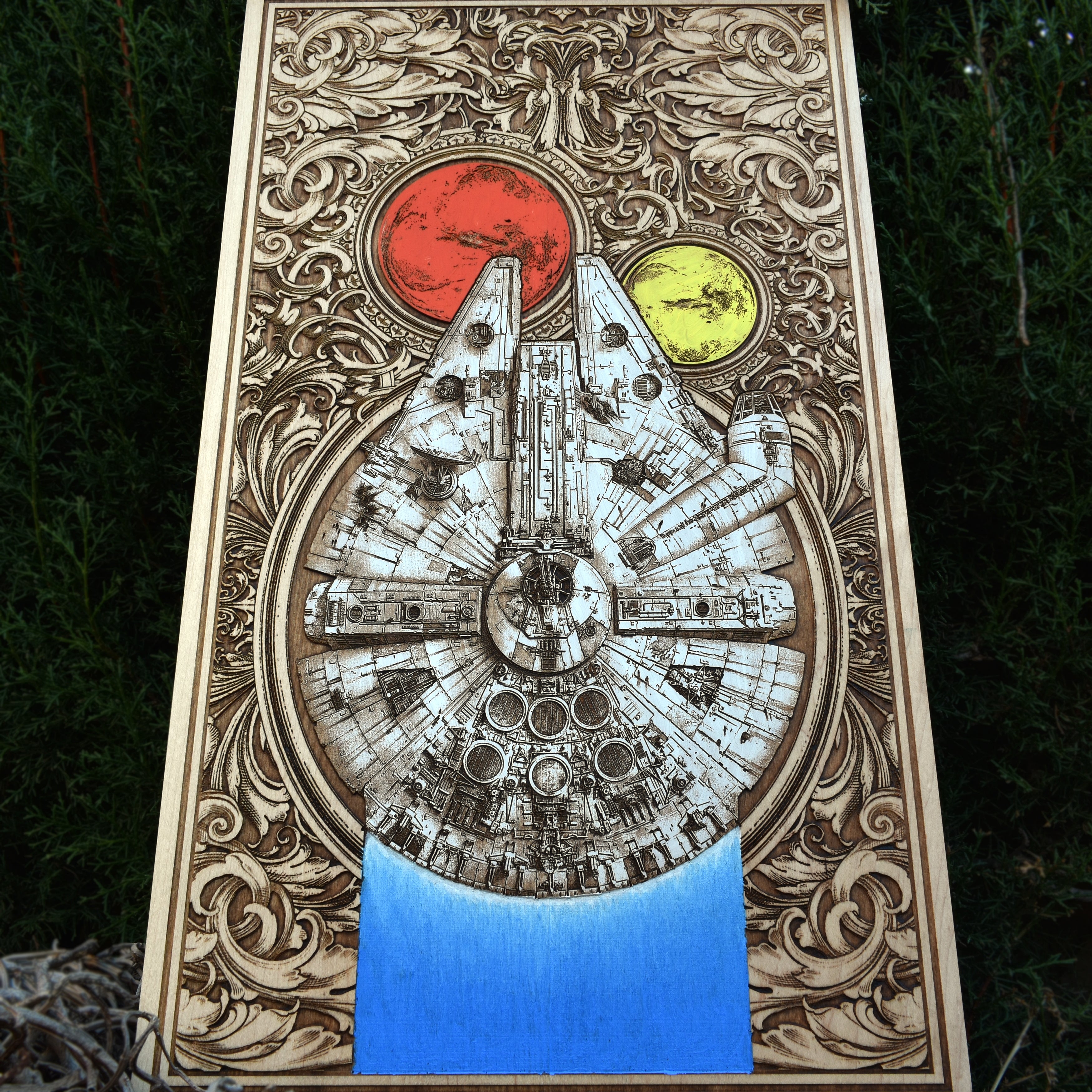 Rustic wooden Star Wars wall art with engraved and painted spaceship designs.
