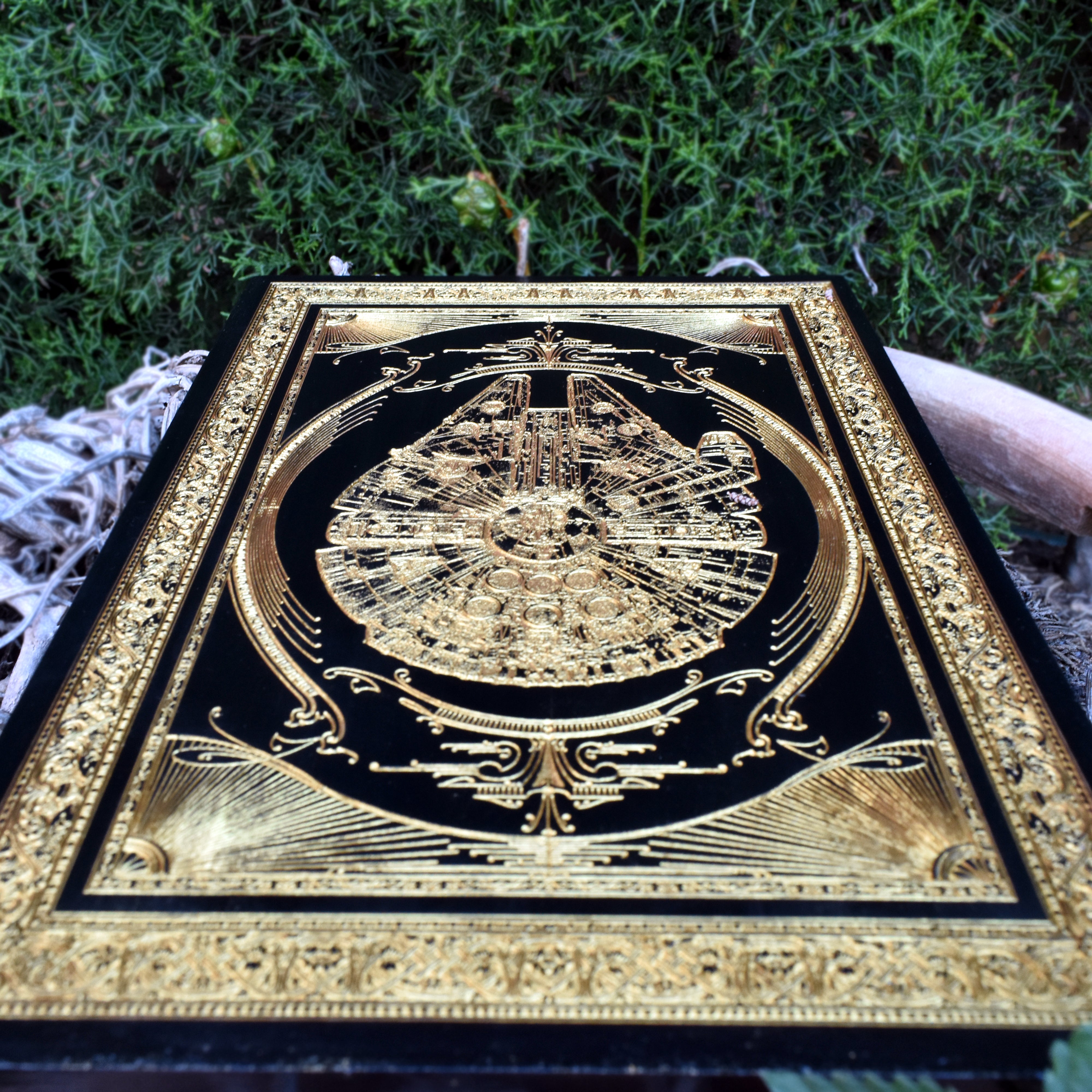 Custom wooden Millennium Falcon ship engraving, perfect Star Wars wall art for collectors.