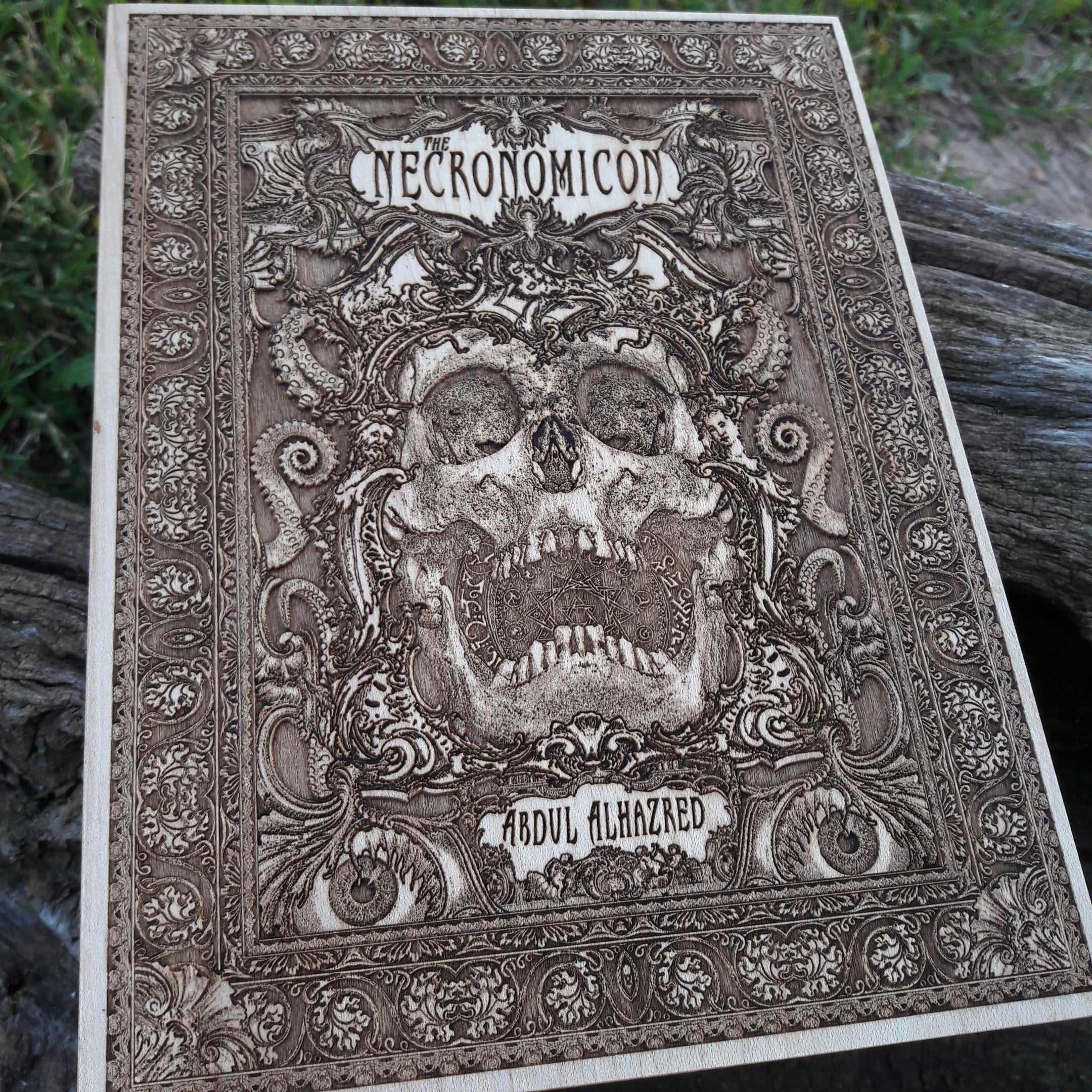 HP Lovecraft wood engraving featuring occult and eldritch horror elements.