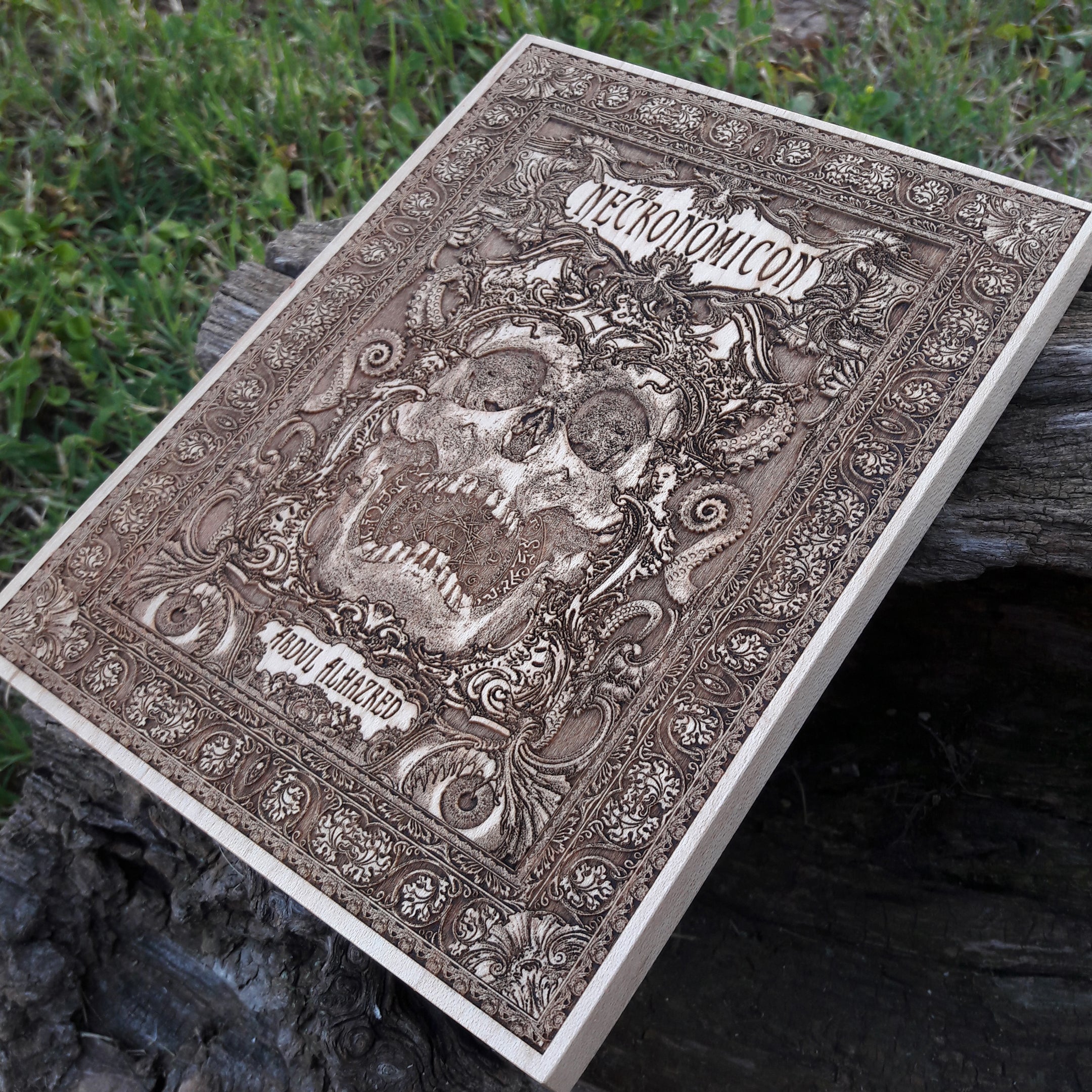 Detailed handmade ram skull wood art – inspired by the Necronomicon.