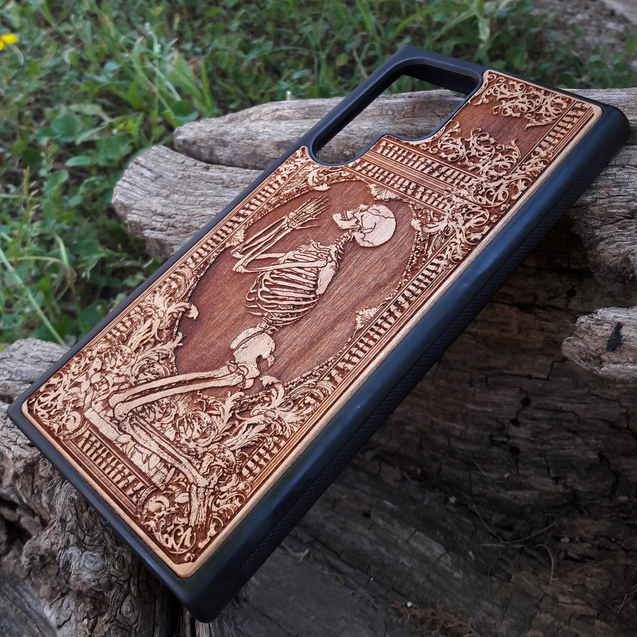 Shop our premium wooden phone cases designed for iPhone , iPhone 15, Galaxy S23, S22, Note 20, and more. Featuring intricate designs like the praying skeleton, it’s the perfect personalized gift for tech enthusiasts. Available for multiple iPhone and Galaxy models, these cases offer durable protection with style.