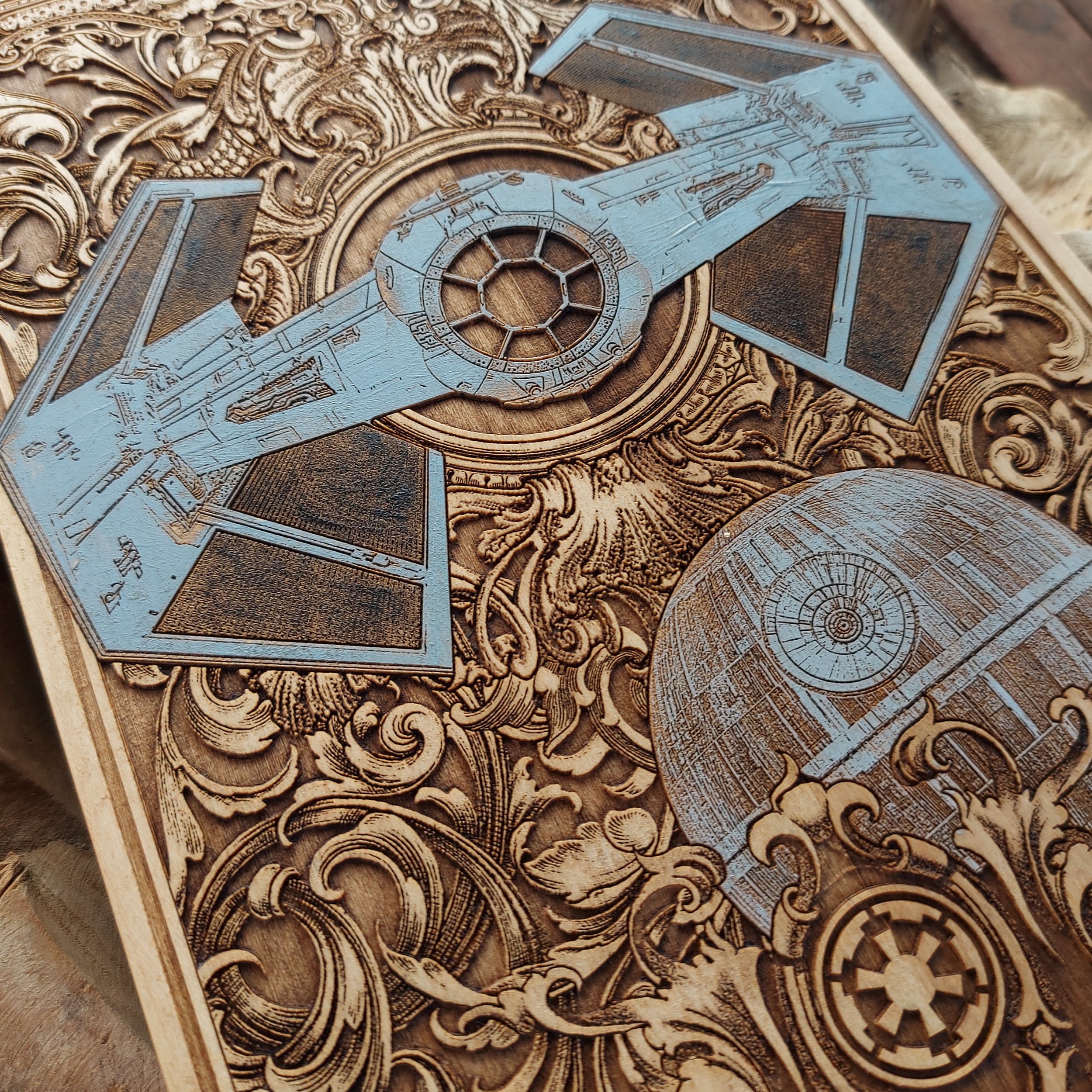 Imperial Starfighter design laser-etched on wood for sci-fi themed rooms.