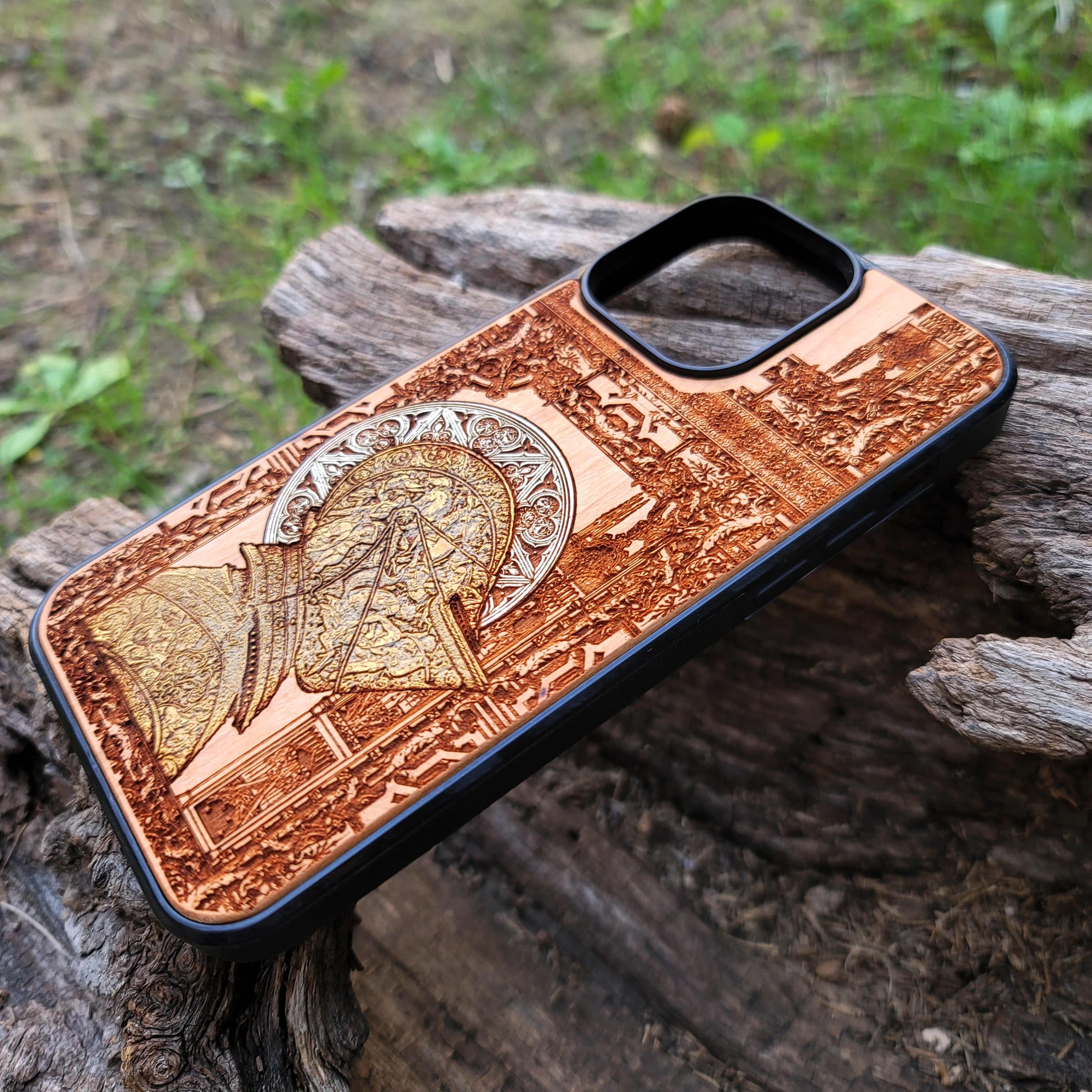 Hand-finished cherry wood phone case with detailed laser engraving, perfect for iPhone & Samsung Galaxy users.