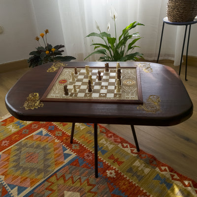 Handmade solid wood coffee table with an inlaid engraved chessboard. Walnut Douglas Fir top with white-stained maple inlay — elegant, functional decor.