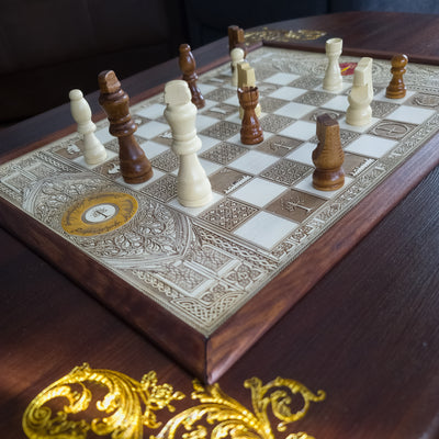 Handmade solid wood coffee table with an inlaid engraved chessboard. Walnut Douglas Fir top with white-stained maple inlay — elegant, functional decor.