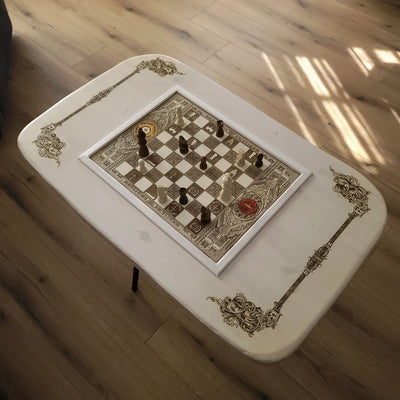 Handmade white-stained chessboard table top with LOTR engraving on maple and douglas fir wood, elegant carved corners, and artisan finish.