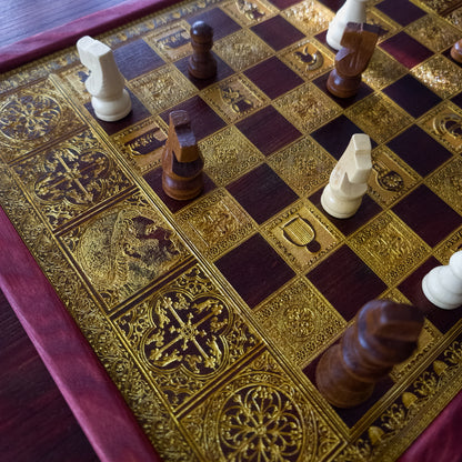 Handmade wooden chessboard coffee table with Roman laser engraving, pine and maple wood, gold details, red walnut finish.