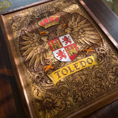 Handmade walnut stained wood coffee table with engraved hand-painted Toledo family crest cedar inlay