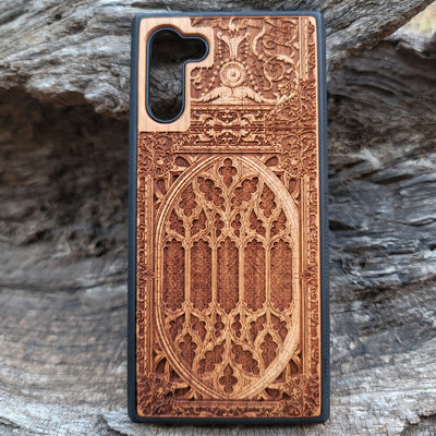 Wooden phone case with intricate gothic pattern, laser-engraved for iPhone , iPhone 15, Samsung Galaxy S, S24, Note 20. Durable and unique, perfect for gothic art fans and collectors.