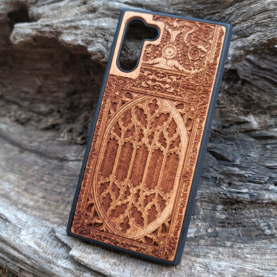 Wooden phone case with intricate gothic pattern, laser-engraved for iPhone , iPhone 15, Samsung Galaxy S, S24, Note 20. Durable and unique, perfect for gothic art fans and collectors.
