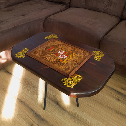 Handmade walnut stained wood coffee table with engraved hand-painted Toledo family crest cedar inlay