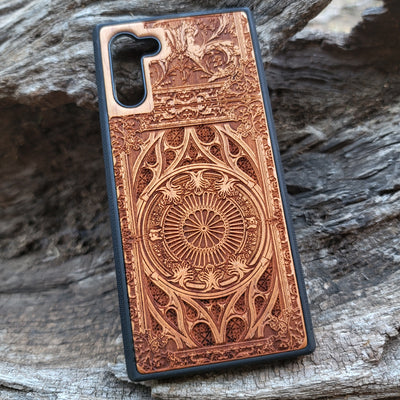 Wooden phone case with intricate gothic pattern, laser-engraved for iPhone , iPhone 15, Samsung Galaxy S, S24, Note 20. Durable and unique, perfect for gothic art fans and collectors.
