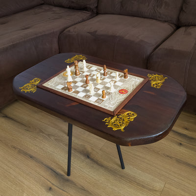 Handmade solid wood coffee table with an inlaid engraved chessboard. Walnut Douglas Fir top with white-stained maple inlay — elegant, functional decor.