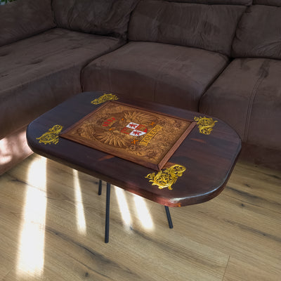 Handmade walnut stained wood coffee table with engraved hand-painted Toledo family crest cedar inlay