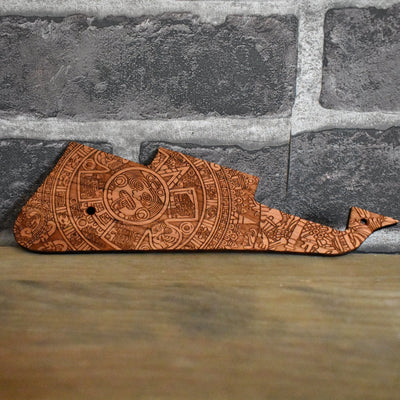 Laser-engraved Aztec calendar design on wood pickguard for Gibson Les Paul.