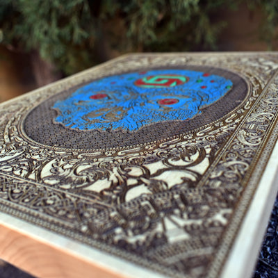 Hand-painted Aztec skull decor on maple, perfect for gothic or tribal themes.