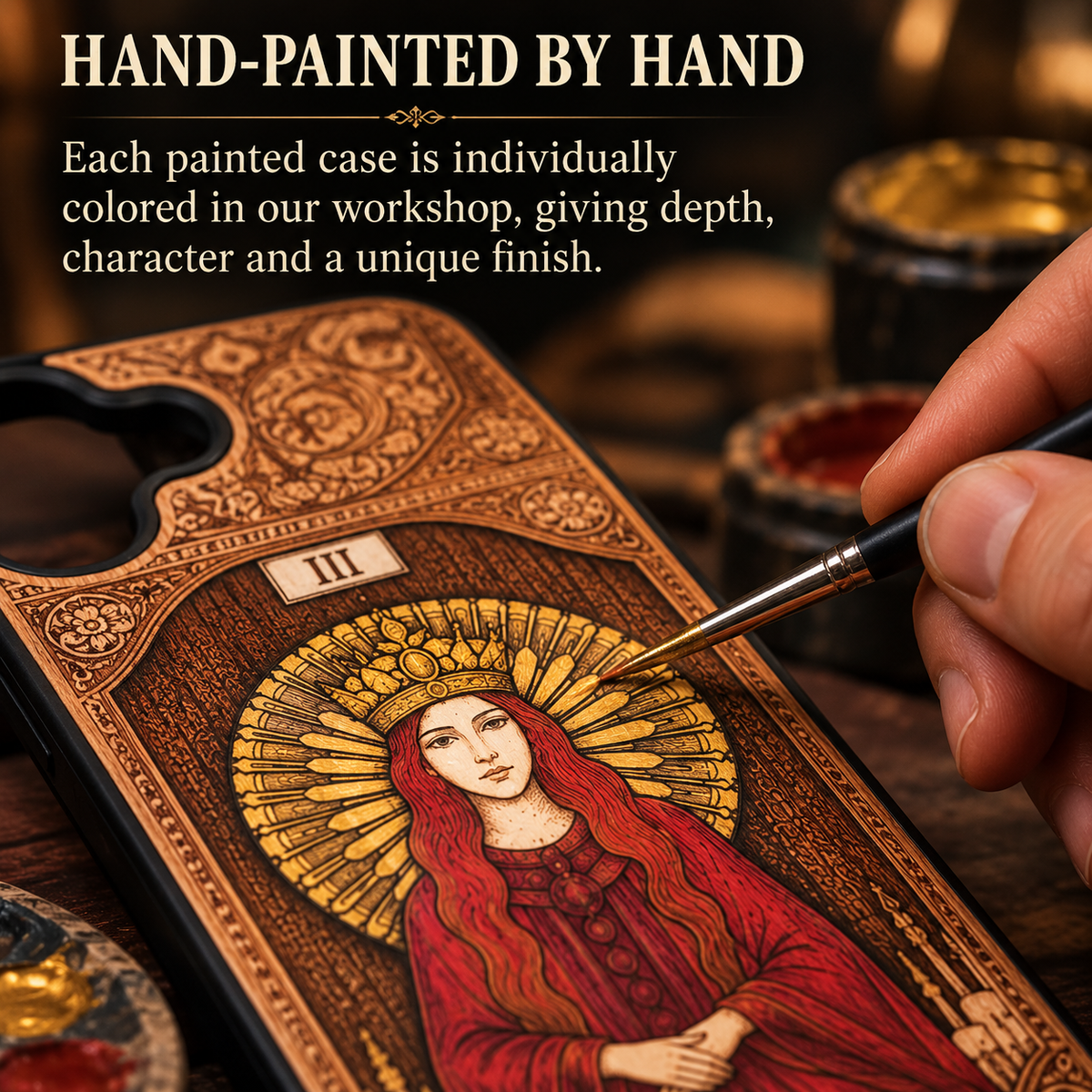Hand painting a custom engraved wood phone case individually in our workshop