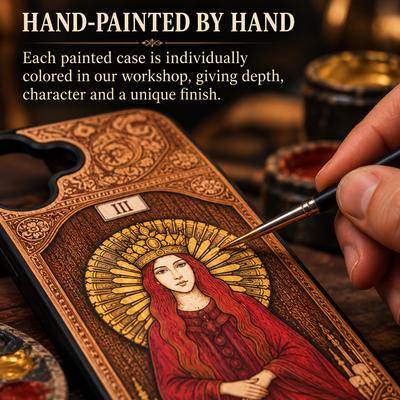 Hand painting a custom engraved wood phone case individually in our workshop