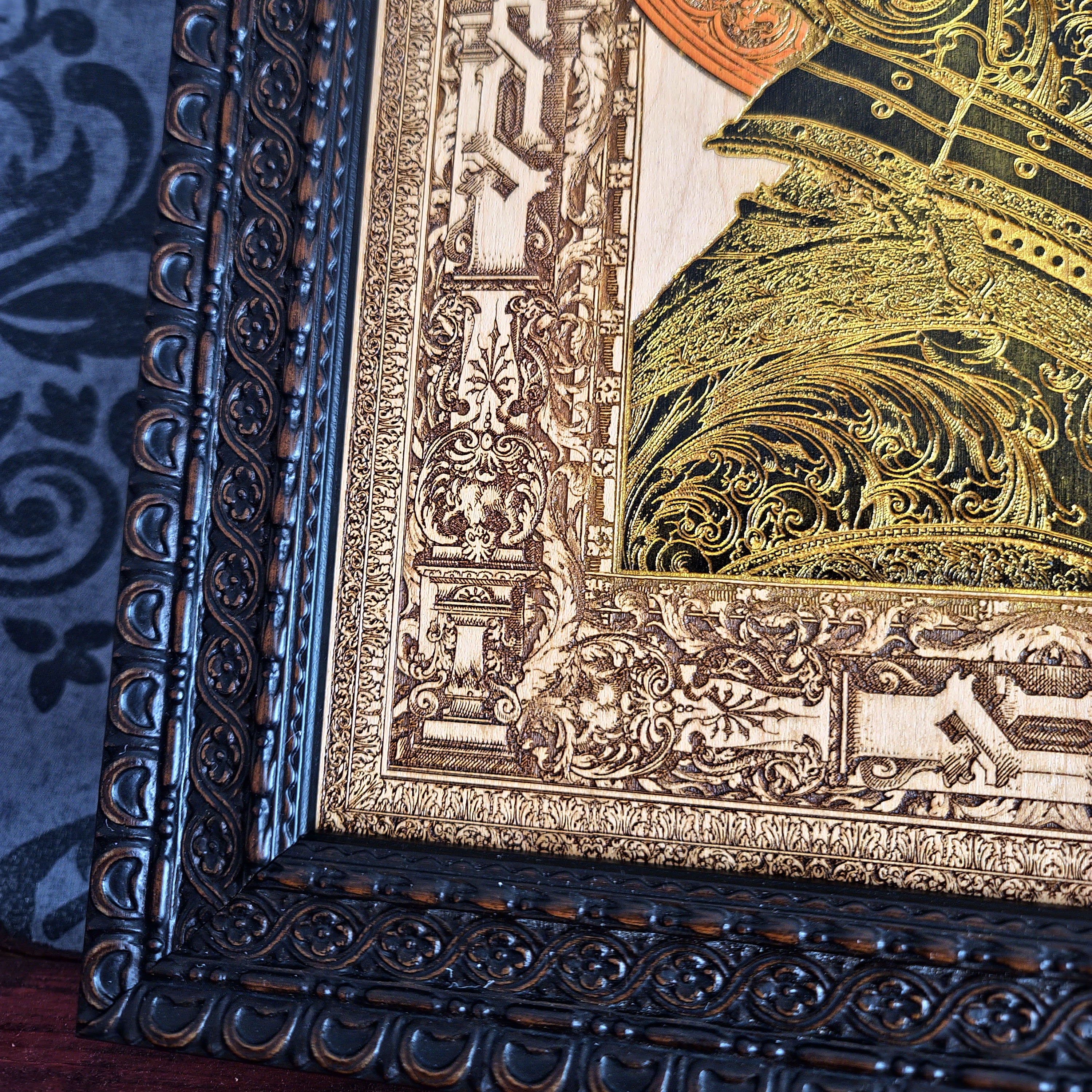 Black-and-gold medieval knight helmet maple wood wall art, close-up of the brown frame, helmet and engraved border